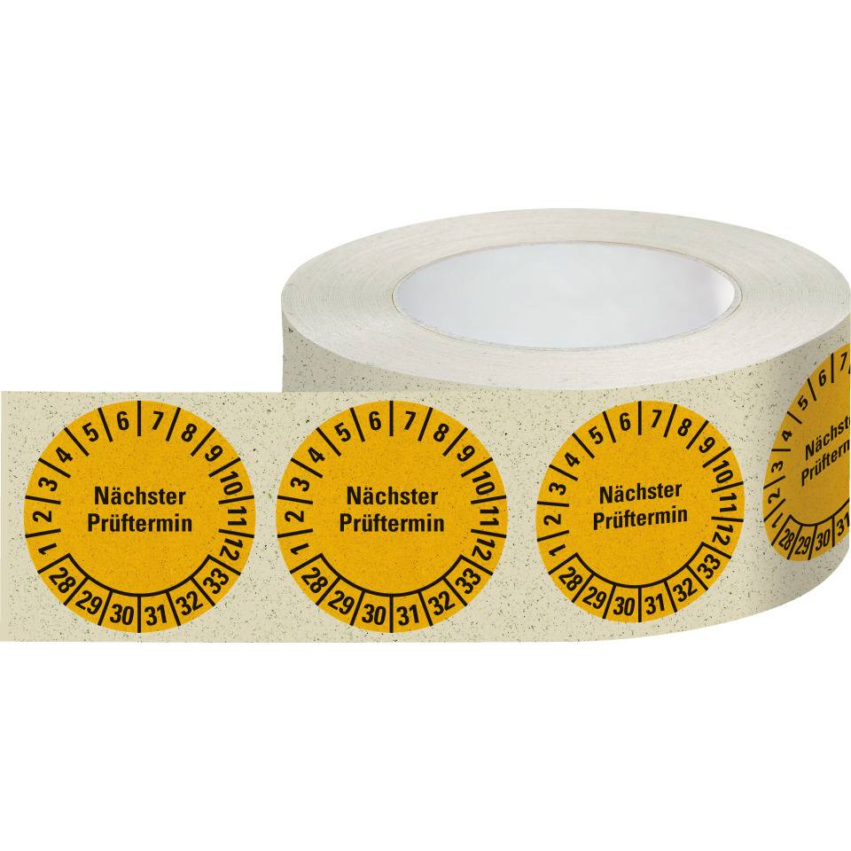Prüfplakette Nächster Prüftermin 28-33, gelb, Graspapier, Ø 30mm, 500/Rolle