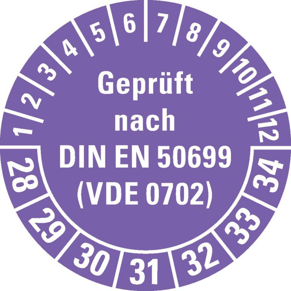 Prüfplakette Geprüft nach DIN EN 50699 (VDE0702) 28-34, violett,Dokumentenfolie, Ø30mm, 500/Rolle