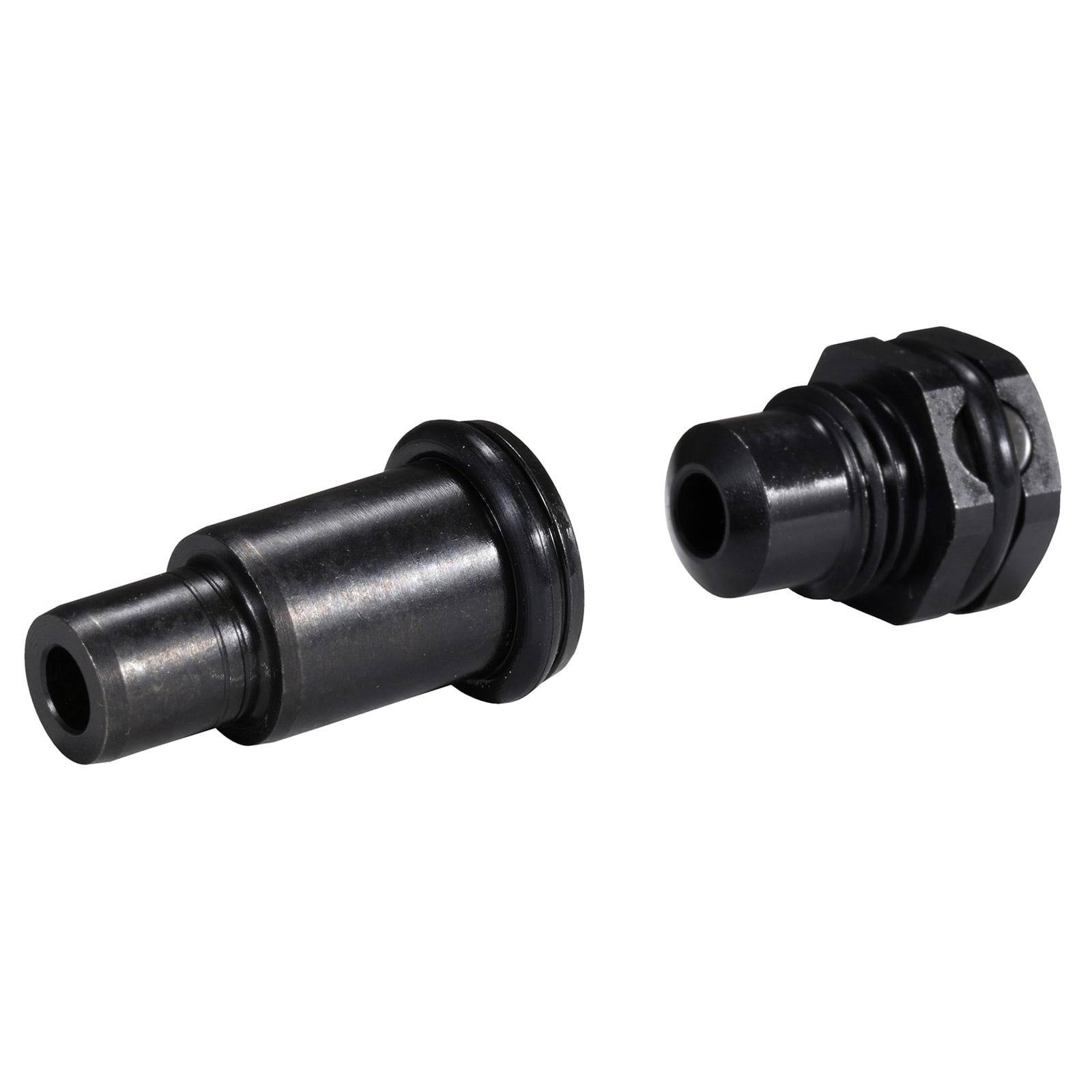 Zwei schwarze Metallkomponenten mit zylindrischen und sechseckigen Formen, horizontal ausgerichtet mit dunklen Oberflächen, vor einem weißen Hintergrund.