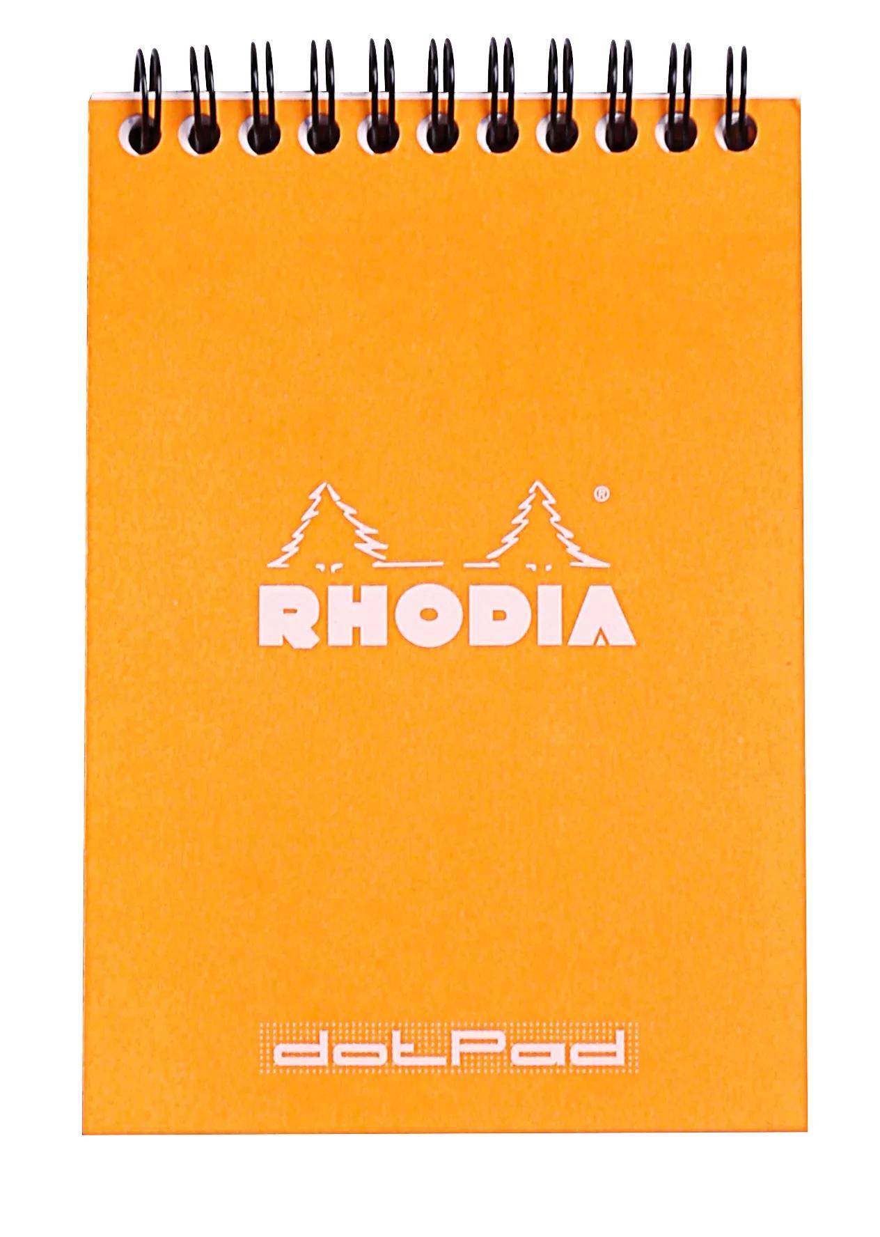 Ein orangefarbener Einband mit dem Logo 'Rhodia', das zwei stilisierte Bäume über dem Markennamen zeigt. Die Wörter 'dot pad' erscheinen in der Nähe des unteren Randes.