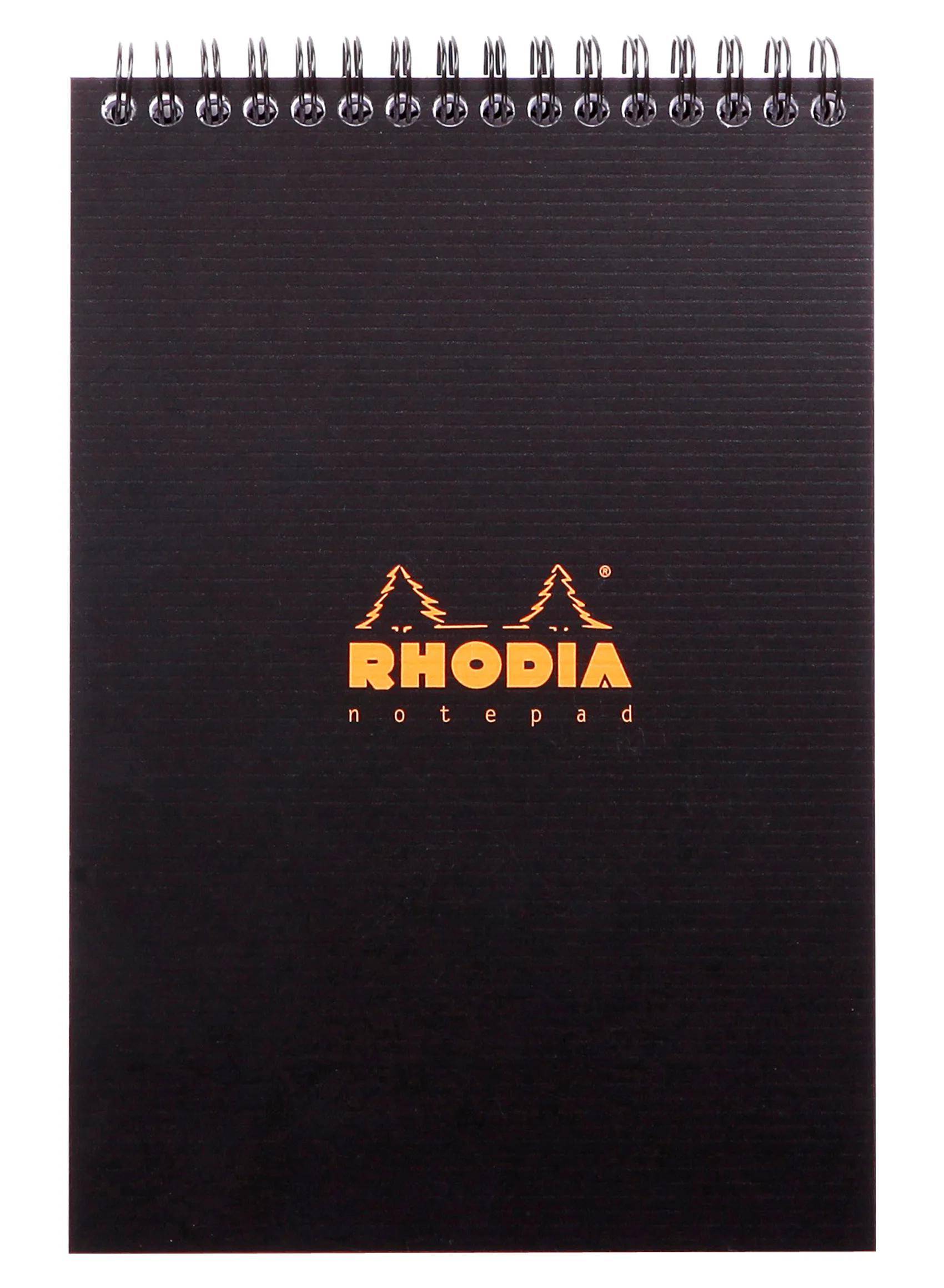 Schwarzes spiralgebundenes Rhodia-Notizbuch mit schlichtem dunklem Umschlag und zentriertem orangefarbenem Logo auf der Vorderseite.