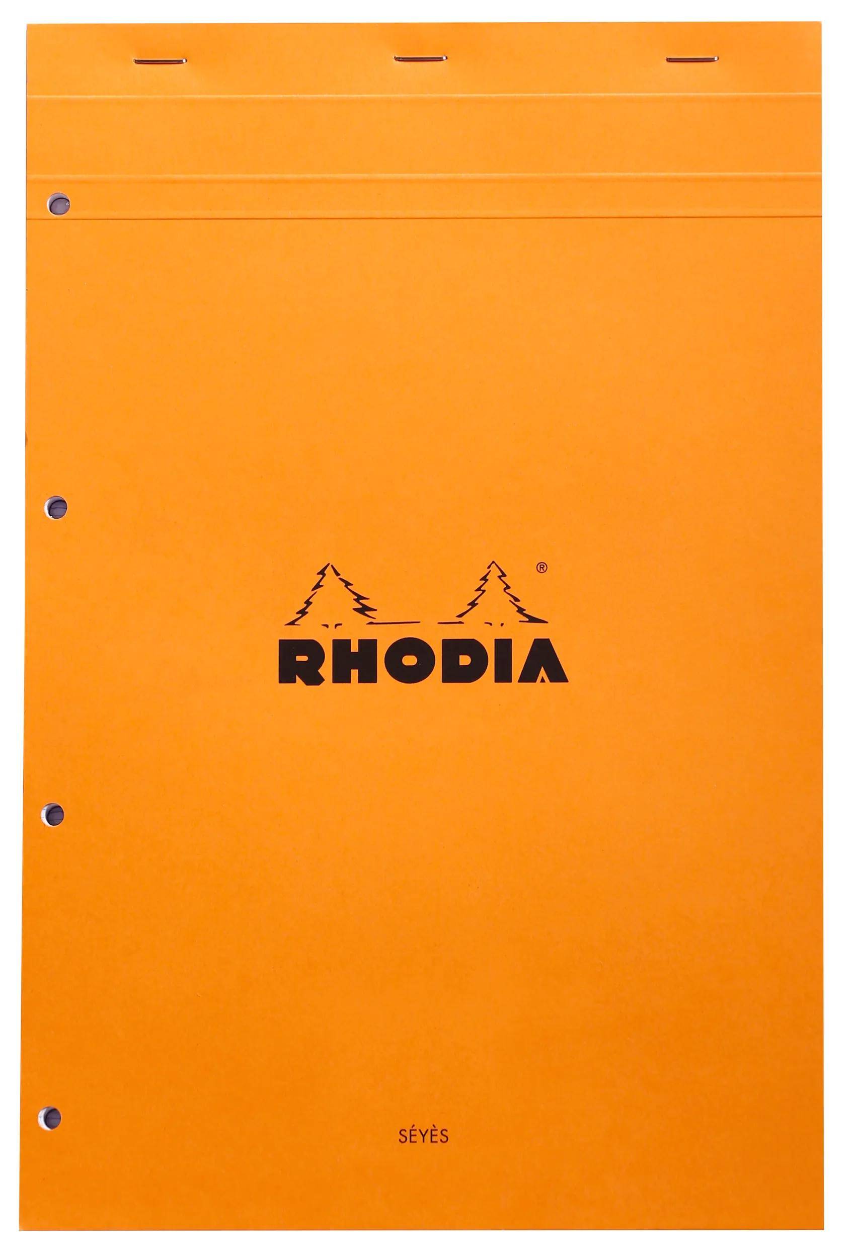 Orange-farbener Rhodia Seyès Notizbuch-Einband mit schwarzem Logo und drei Bindungslöchern auf der linken Seite.