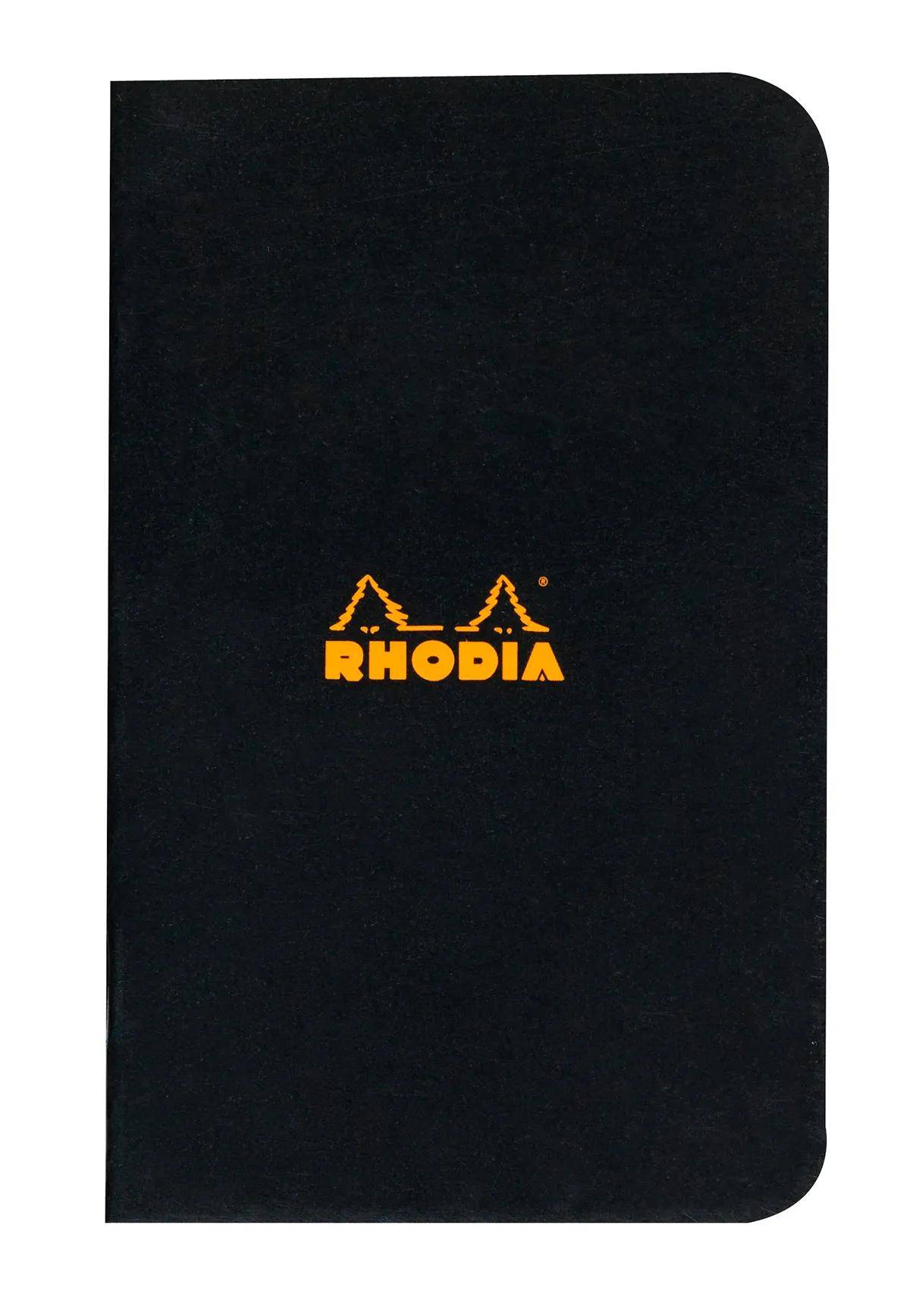 Schwarzer Rhodia-Notizbucheinband mit zentriertem orangefarbenem 