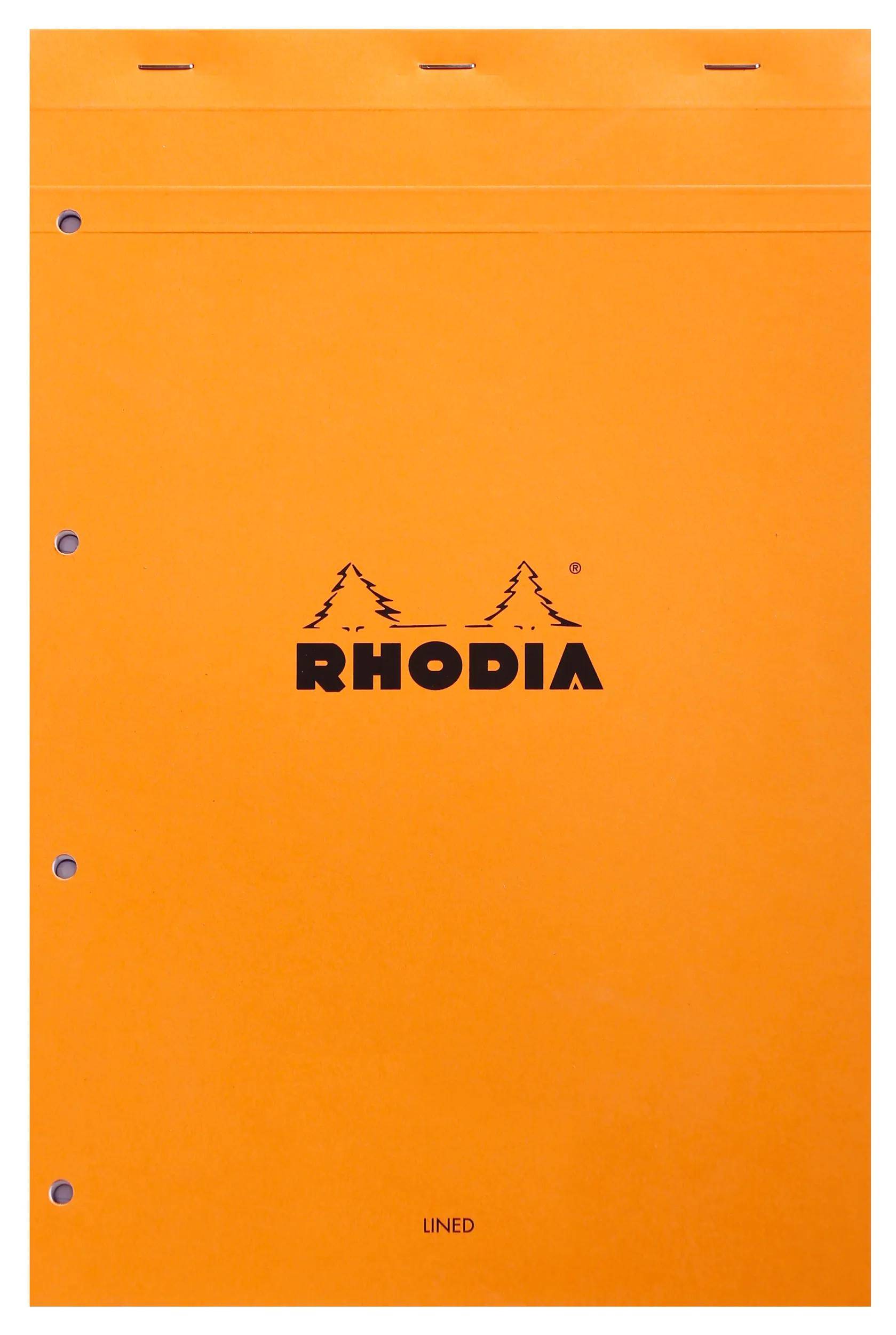 Ein orangefarbenes Rhodia-Notizbuch mit einem Logo aus zwei Kiefern und dem Wort „Rhodia
