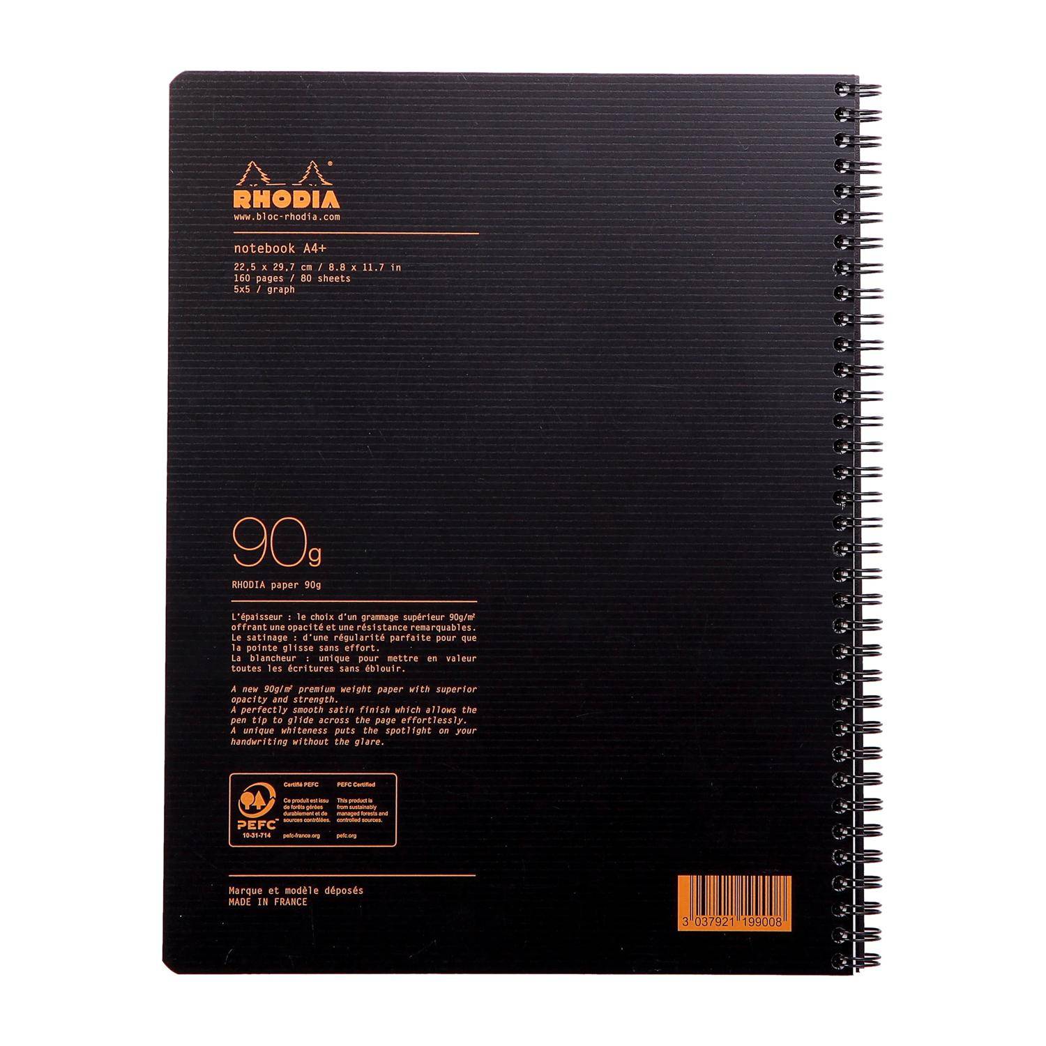 Schwarzes spiralgebundenes Rhodia-Notizbuch von vorne gezeigt, beschriftet mit 'notebook A4+', '90g', mit orangenem Text und Barcode.