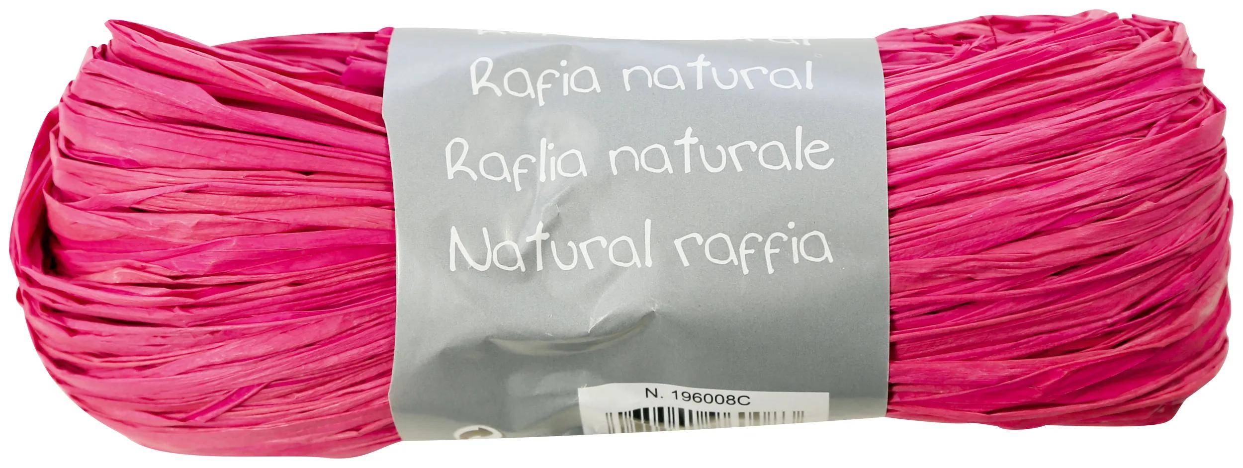 Rosa Kugel aus Raffiabast, umwickelt mit einem grauen Etikett mit der Aufschrift „Rafia natural