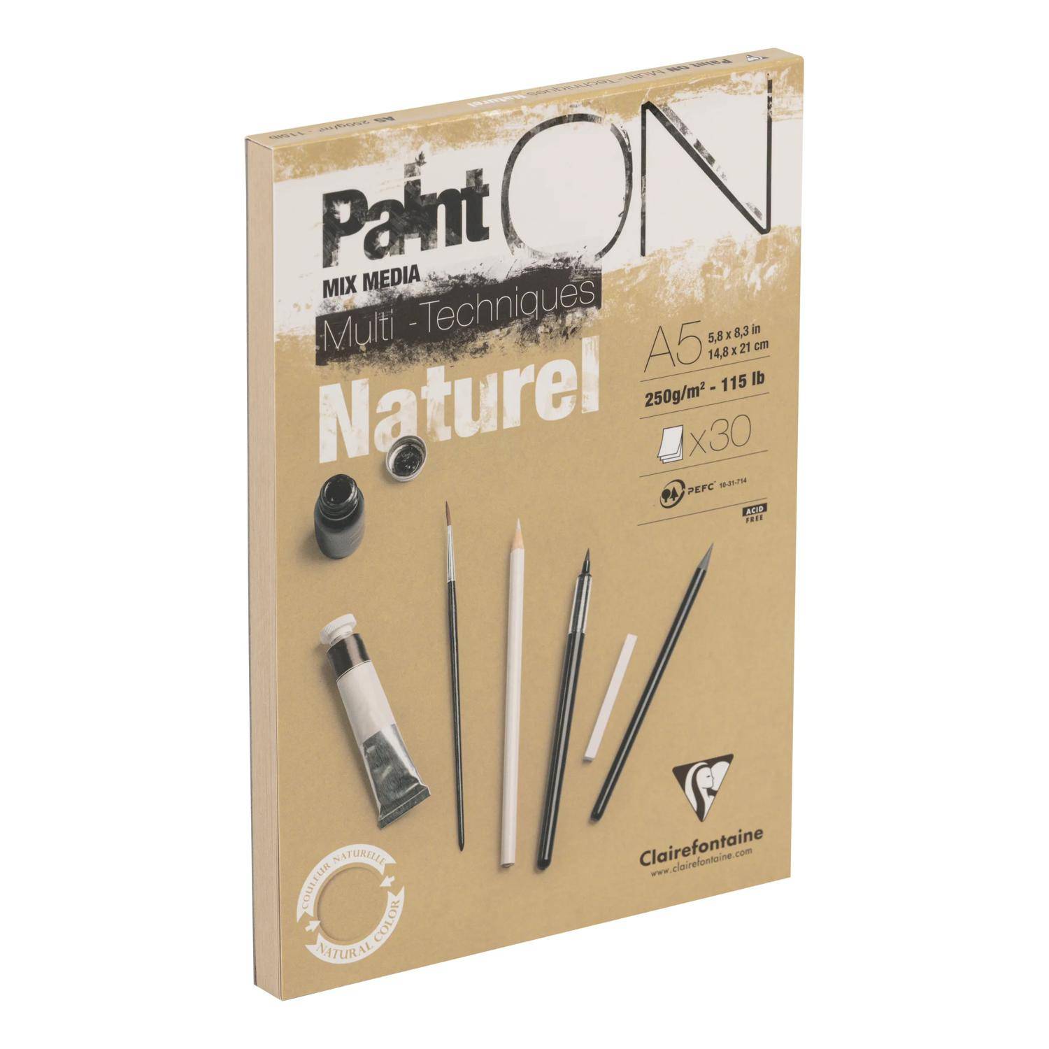 PaintON Naturel Künstlermischmedien-Papierblock, A5-Format, 30 Blatt, gezeigt auf einem beigen Umschlag mit Kunstwerkzeugen und der Marke Clairefontaine.
