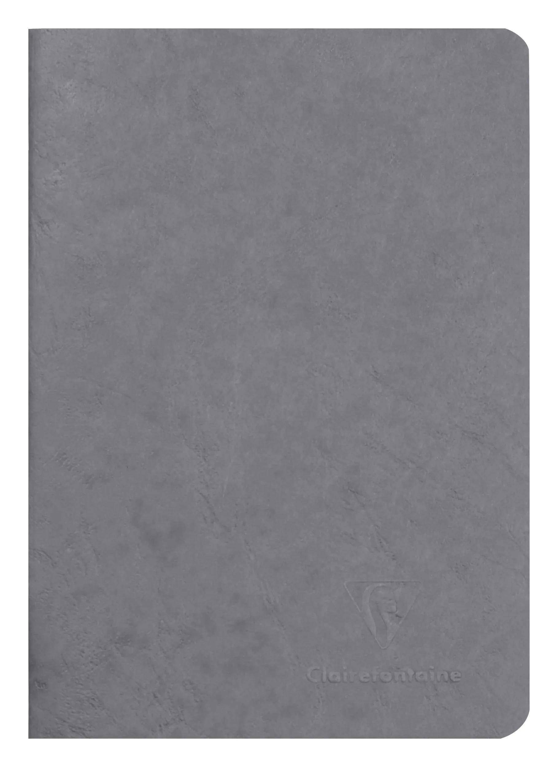 Geschlossener grauer Notizbucheinband mit abgerundeten Ecken und subtlem geprägtem „clean notebook