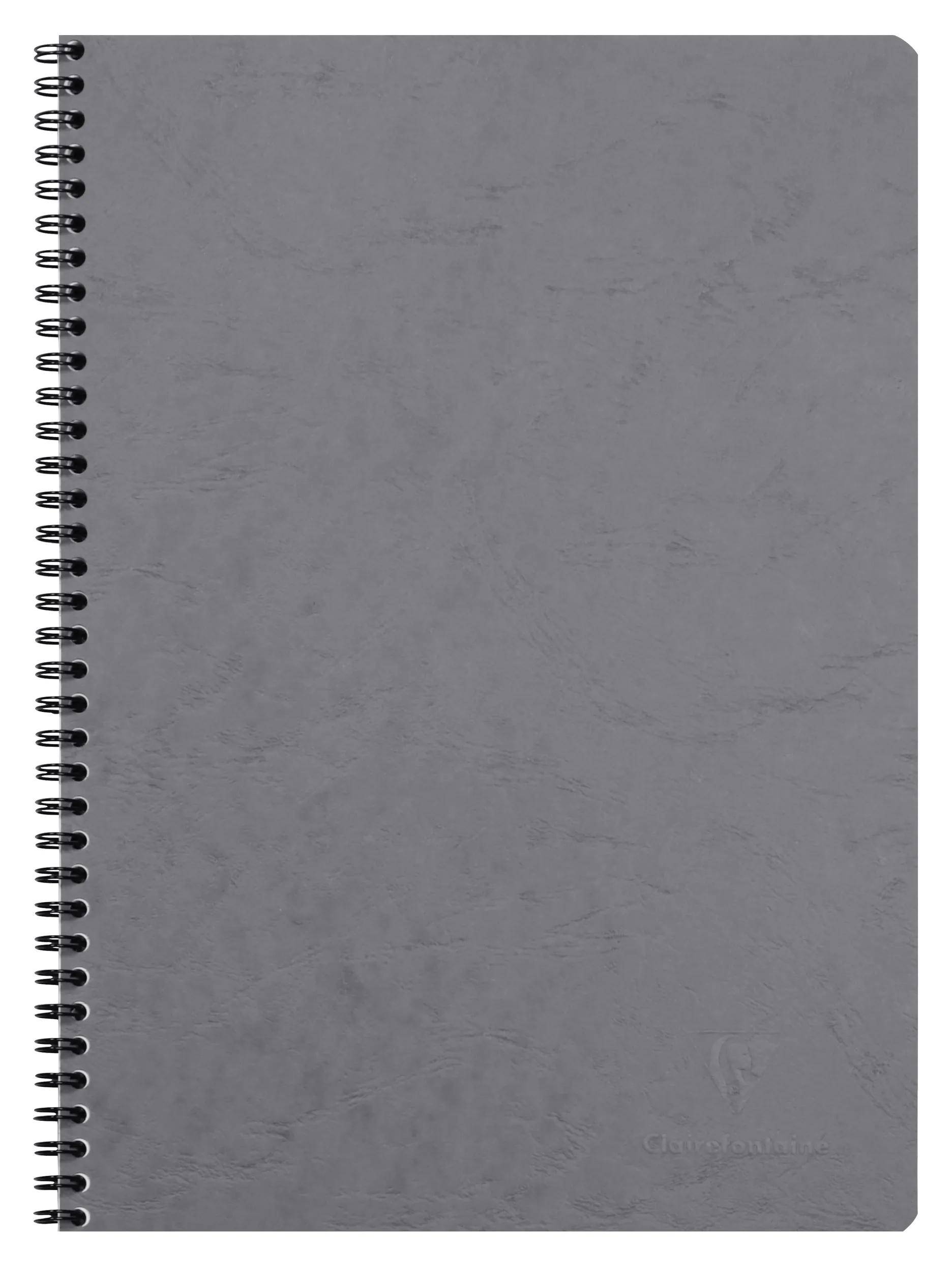 Geschlossenes graukariertes spiralgebundenes Notizbuch mit schlicht gestaltetem Einband, auf weißem Hintergrund gezeigt.