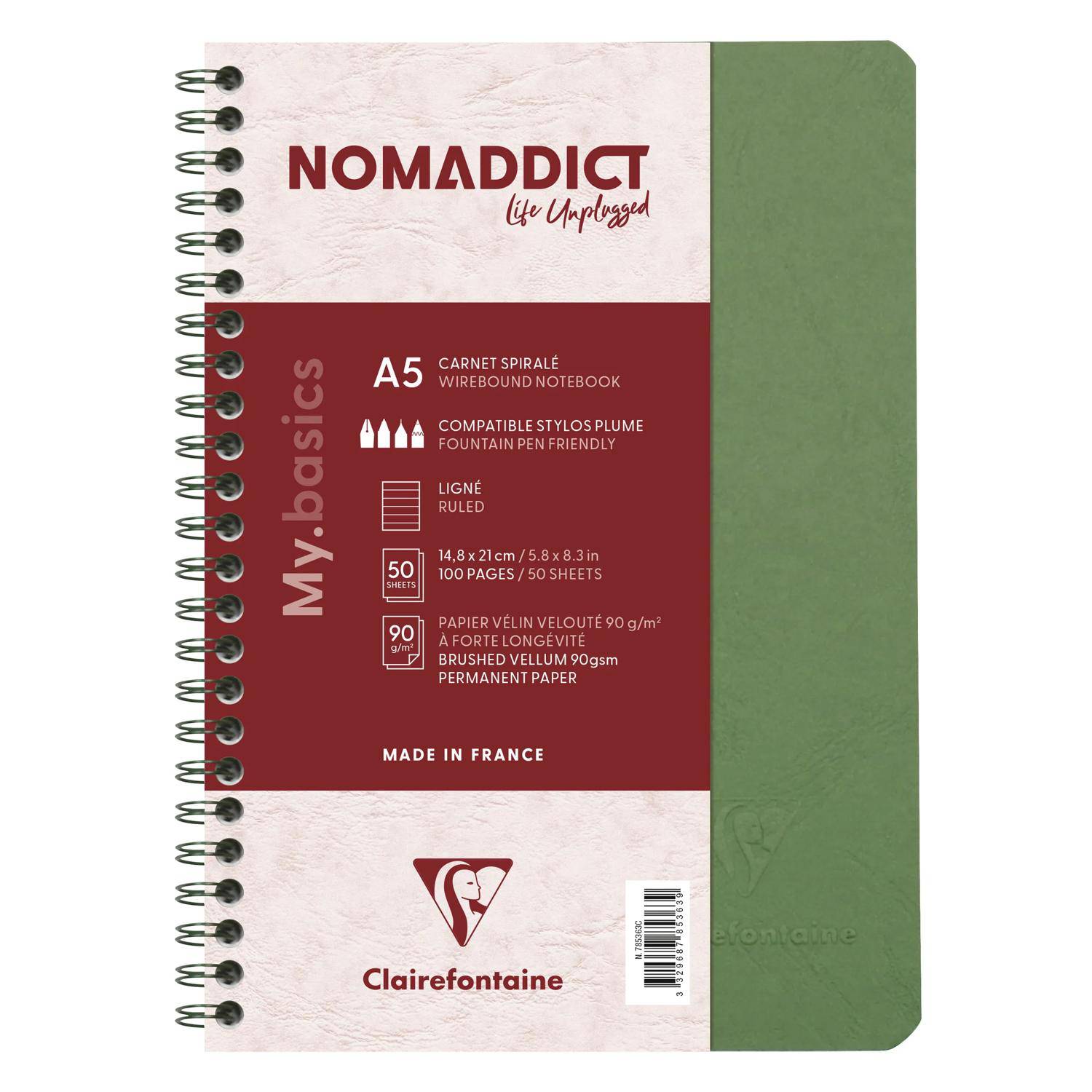 Spiralgebundenes A5-Notizbuch von Nomaddict/Clairefontaine mit grünem Einband und rotem Etikett; liniert, fountainpen-freundlich, 100 Seiten, hergestellt in Frankreich.