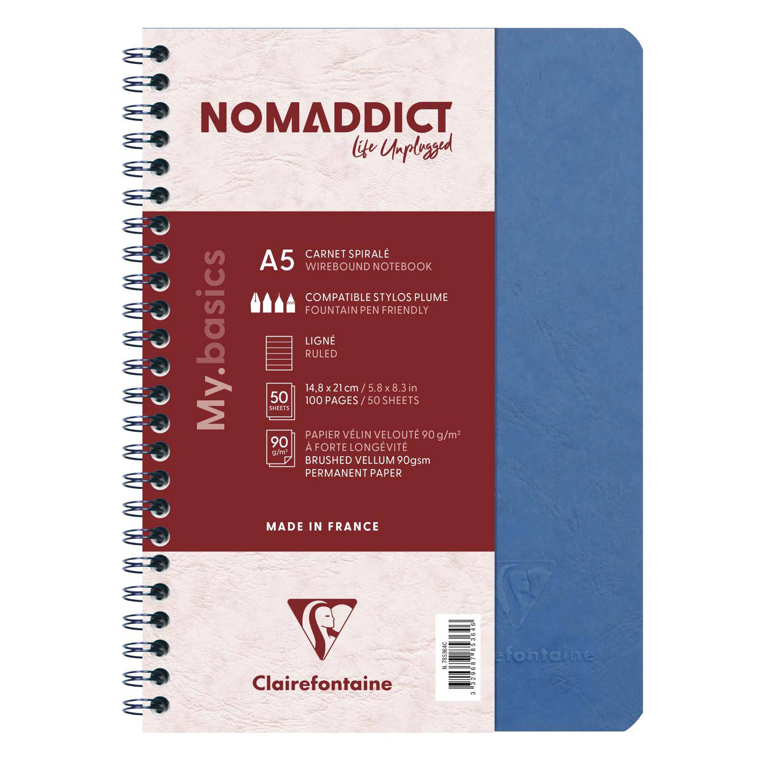 Blaues spiralgebundenes A5-Notizbuch mit Linien von Clairefontaine, beschriftet mit „NOMADDICT Life Unplugged