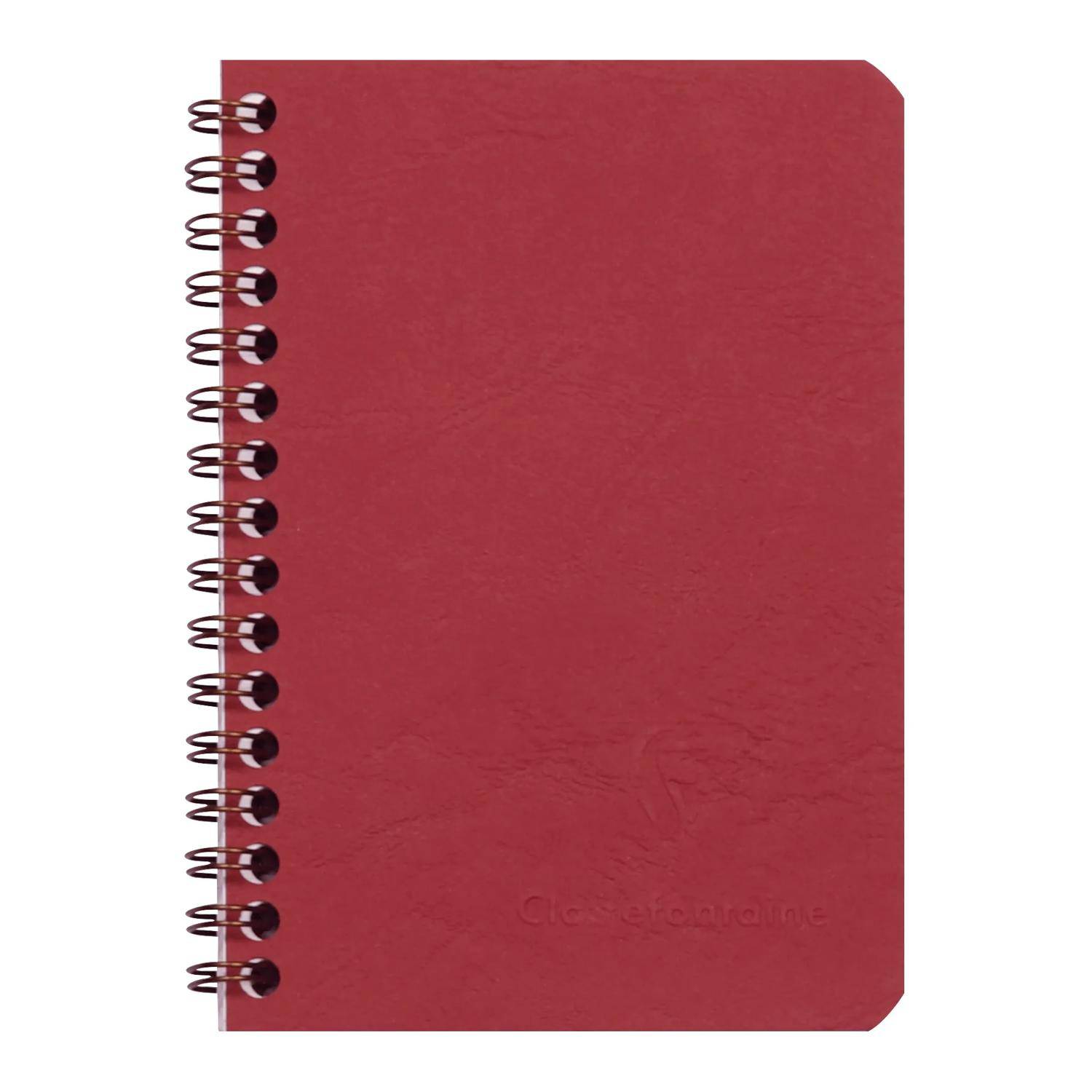 Rotes spiralgebundenes Notizbuch mit leerem Umschlag, geschlossen auf weißem Hintergrund gezeigt.