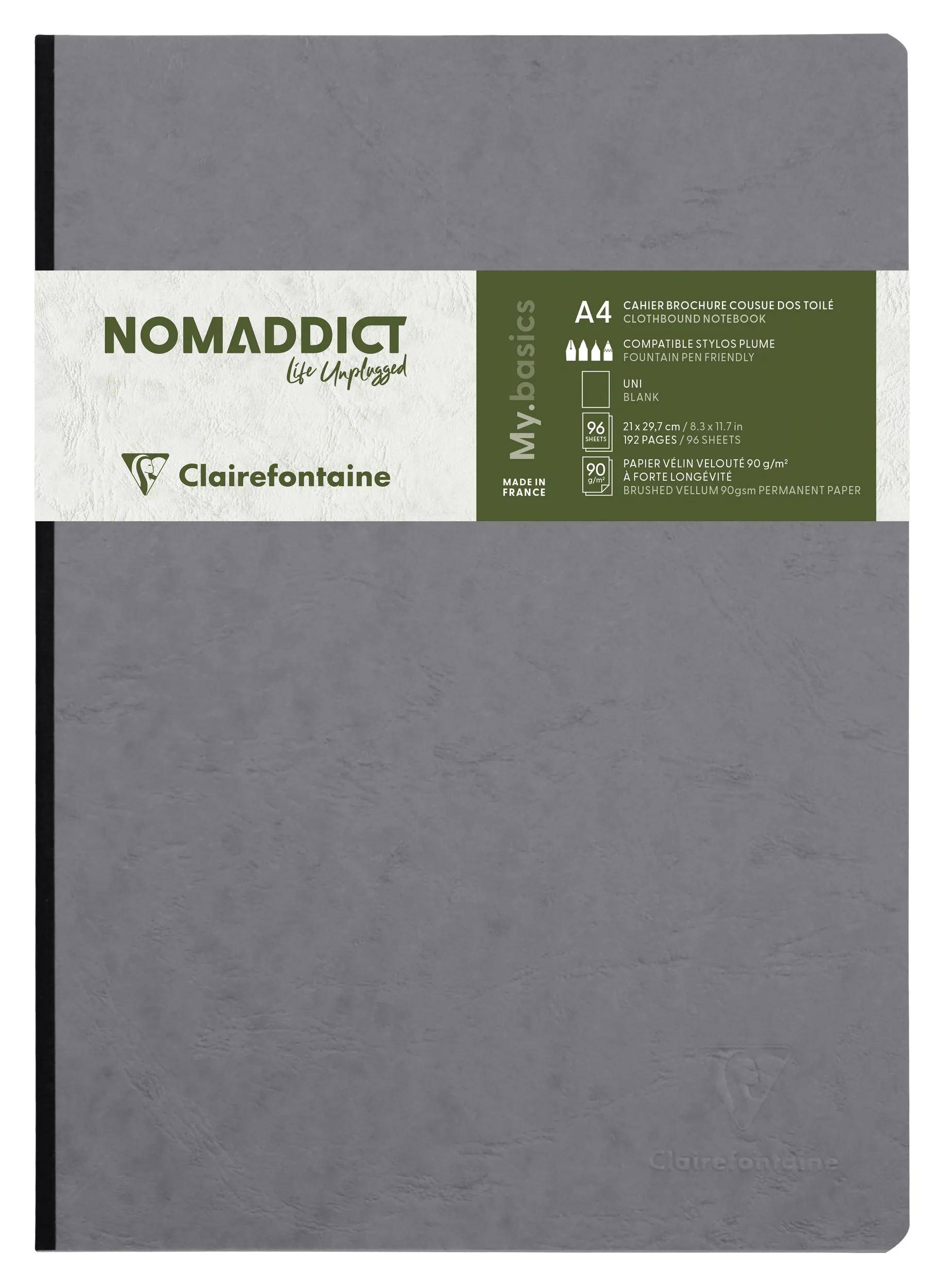 Grauer Nomadict von Clairefontaine A4-Notizbuchcover mit grüner und weißer Banderole, die Produktdetails und Markenlogo anzeigt.