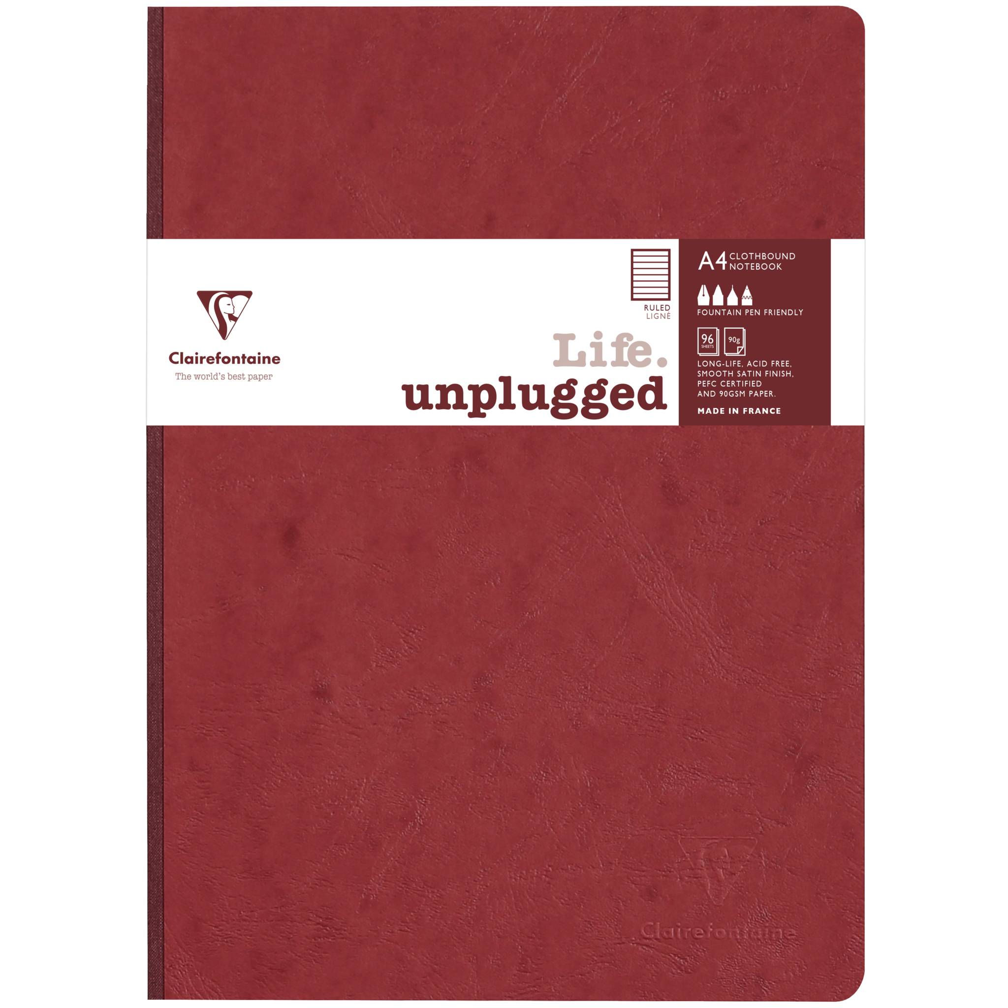 Rotes Clairefontaine A4 Notizbuch mit einem weißen Bandetikett mit der Aufschrift „Life unplugged" auf dem Umschlag.