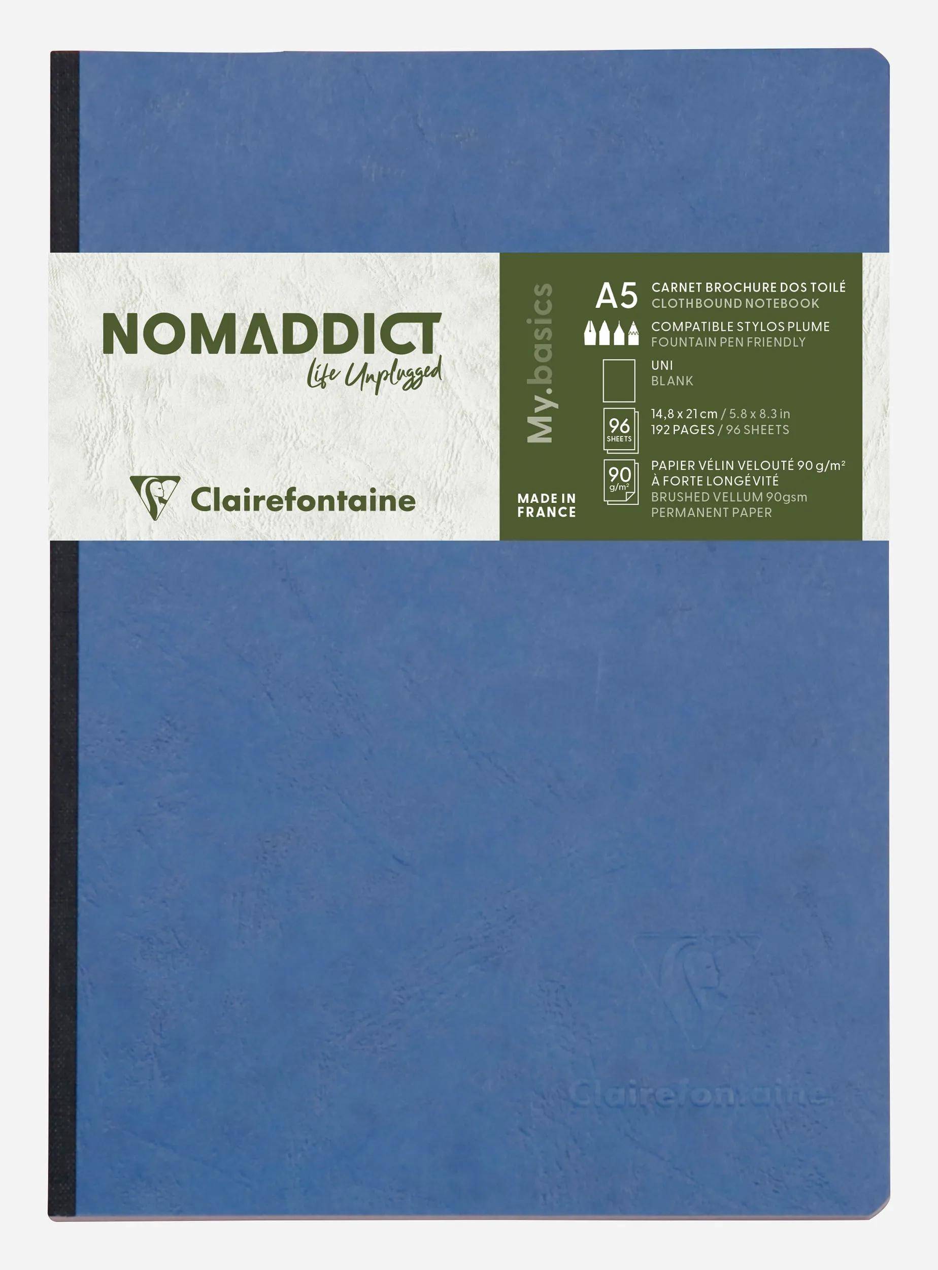 Blaues Clairefontaine 'NOMADDICT' A5-Notizbuch mit Gummibandverschluss und 96 Seiten, Vorderseite gezeigt.