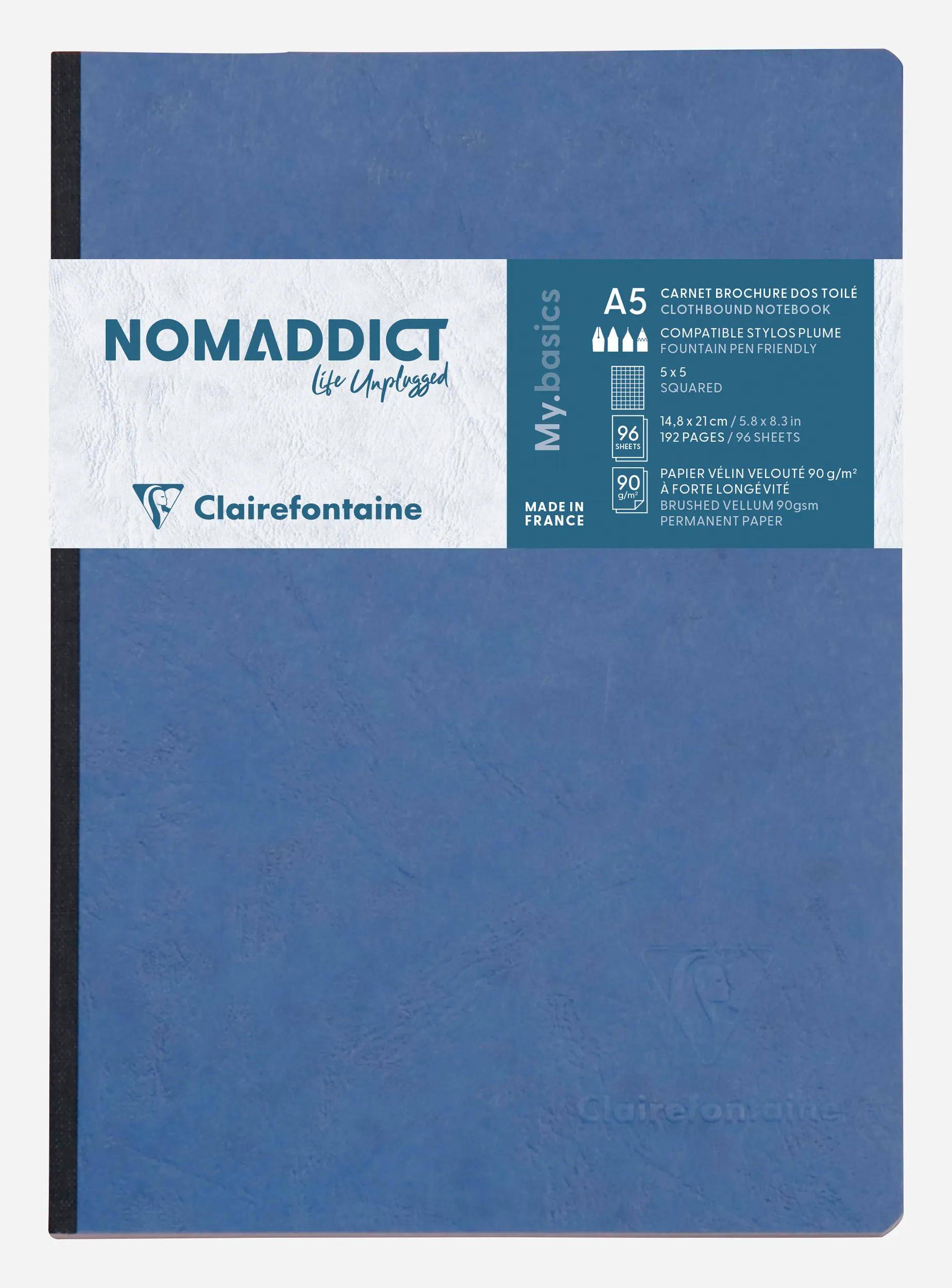 Blaues Clairefontaine Nomadict A5 Notizbuch mit Produktetikett, das 96 Seiten und die Marke „My basics