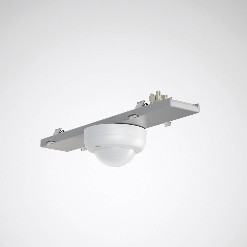 Deckenmontierter Bewegungssensor in minimalistischem Design, mit weißer Kuppel und metallischer Basis, verwendet zur Bewegungserkennung in einem Raum.
