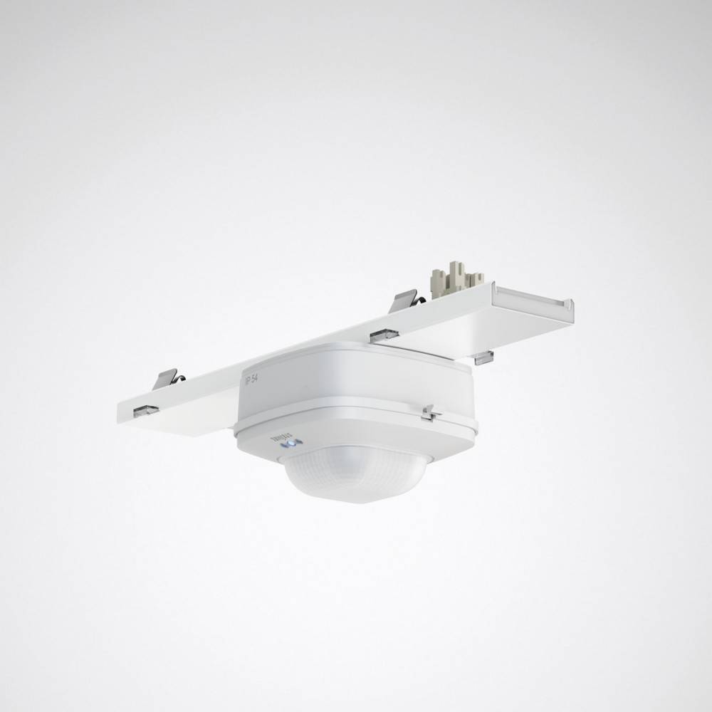 Ein weißer, an der Decke montierter Sensor, der zur Bewegungserkennung entwickelt wurde, mit rechteckiger Form und einer Kuppel an der Unterseite zur Erfassung von Aktivitäten.