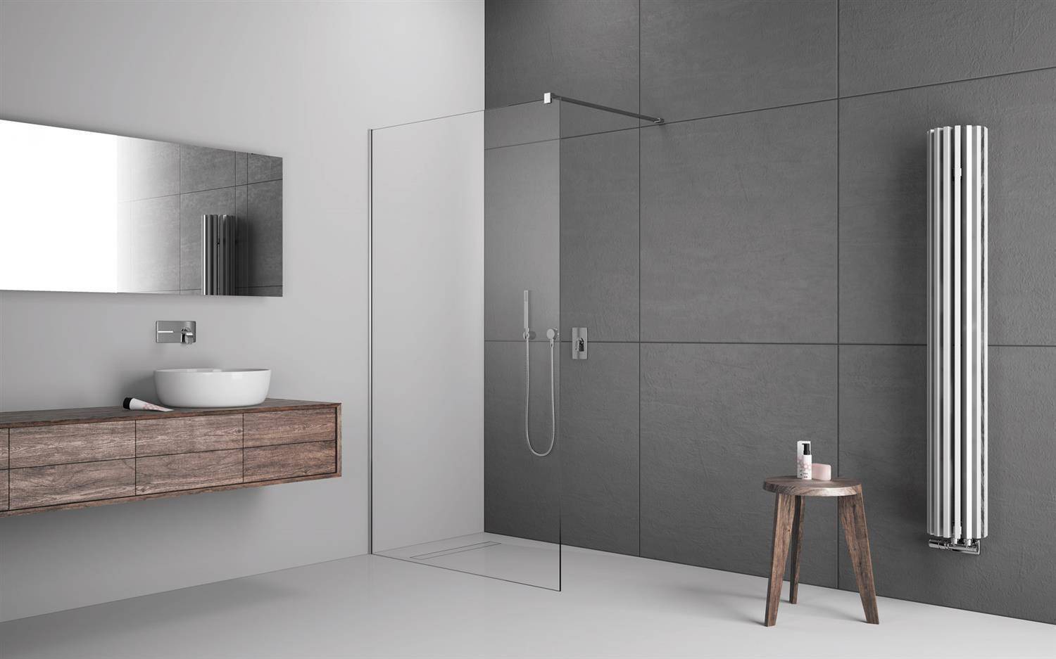 Modernes minimalistisches Badezimmer mit begehbarer Glasdusche, schwebendem Holzwaschtisch, Wandspiegel und verchromtem Handtuchheizkörper an grauen Fliesenwänden.