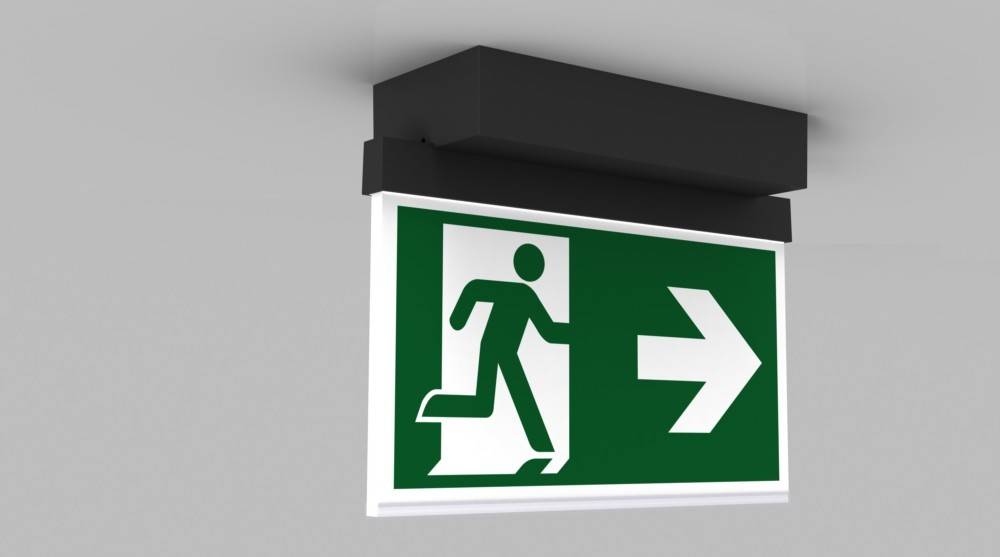 Grünes Notausgangsschild mit einer laufenden Figur und einem nach rechts weisenden Pfeil, der die Richtung zum Ausgang anzeigt.