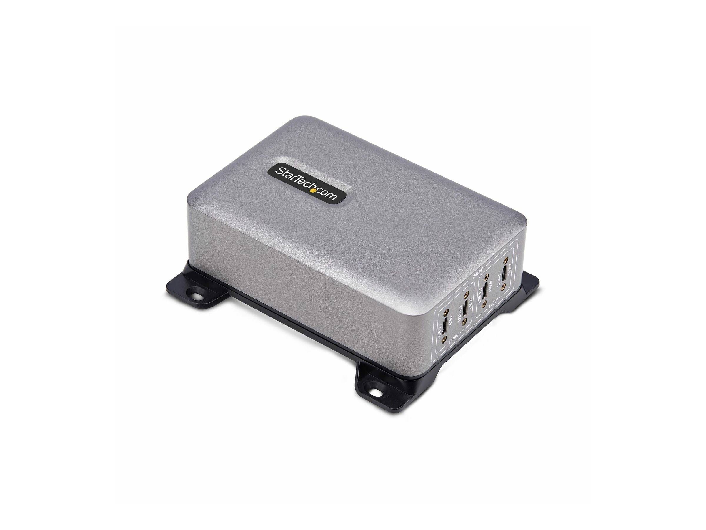 USB-Hub in Silber mit vier Anschlüssen von 'StarTech.com', der auf einem schwarzen Halterungsträger ruht. Ideal zur Organisation mehrerer Geräte.