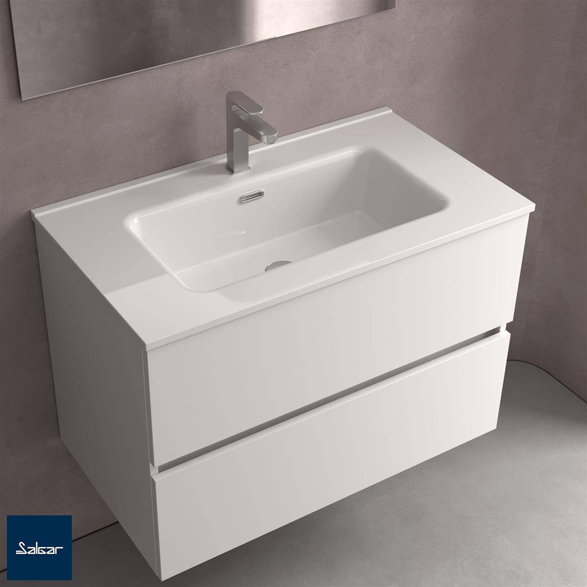 Modernes weißes Badezimmerwaschbecken mit integriertem Waschbecken, einzelnem Wasserhahn und zwei grifflosen Schubladen an einer grauen Wand.