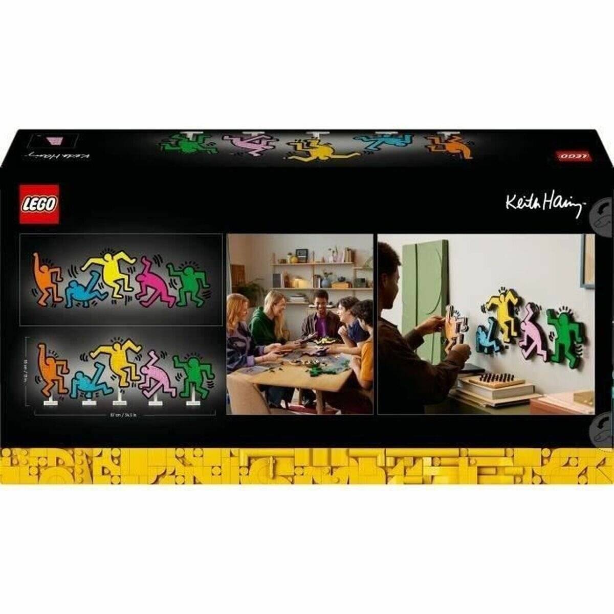 LEGO Keith Haring Set Box mit farbenfroher Tanzfiguren-Wandkunst, Montagebildern und einer Person, die das Kunstwerk an der Wand befestigt.