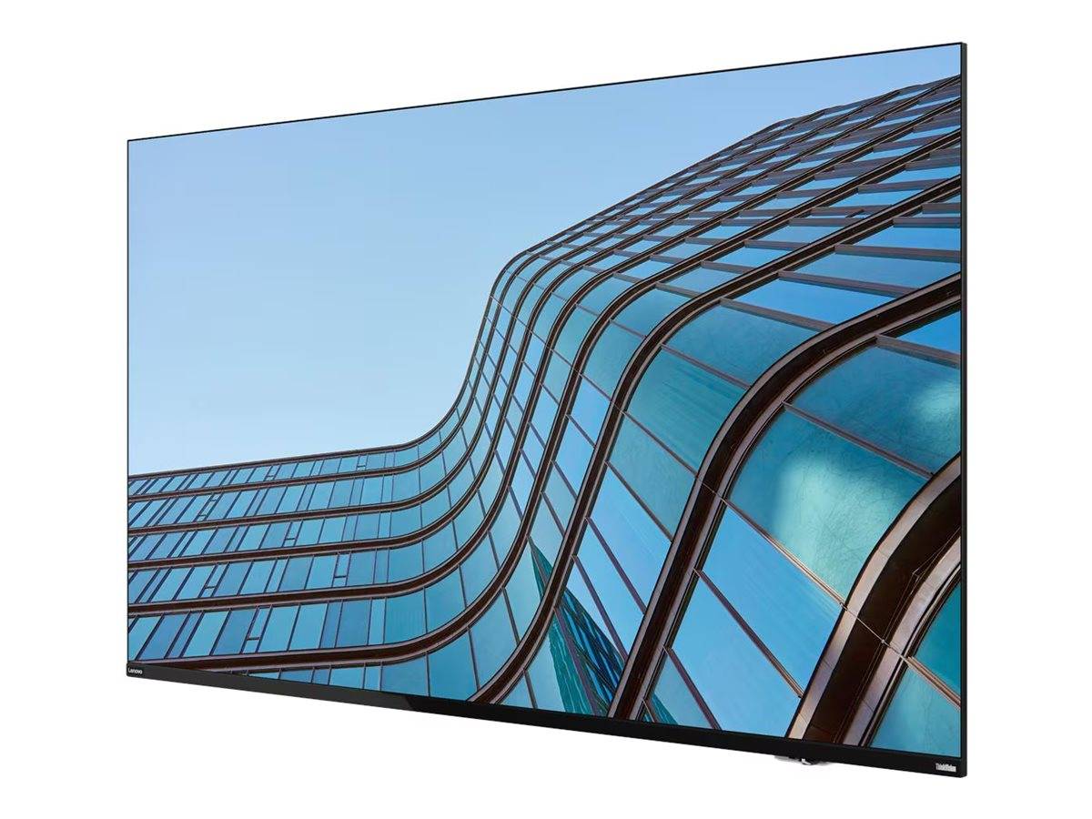Gekrümmte Glasfassade eines modernen Gebäudes unter einem klaren blauen Himmel, die ein elegantes architektonisches Design und reflektierende Fenster zeigt.