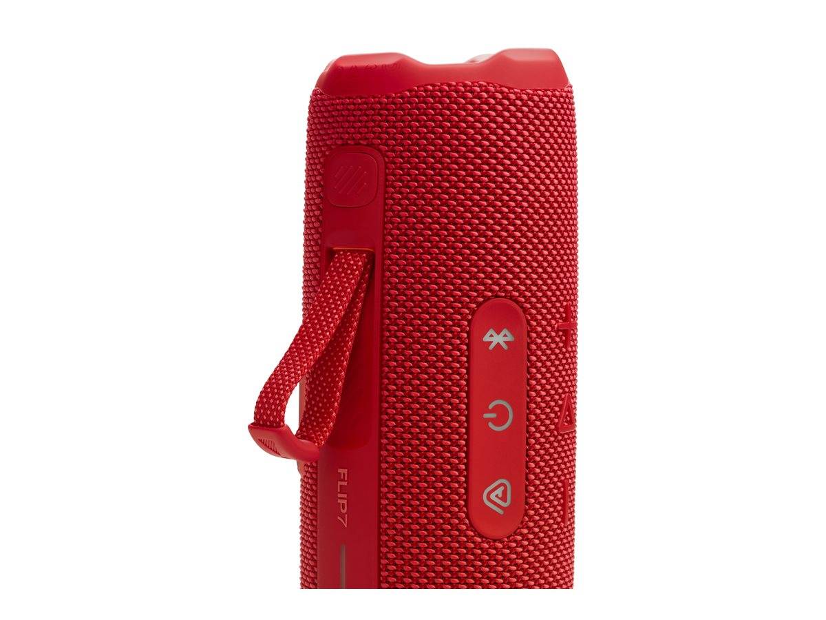 Ein roter tragbarer Bluetooth-Lautsprecher mit sichtbaren Lautstärke-, Ein-/Aus- und Wiedergabetasten; an seiner Seite ist ein Trageriemen befestigt.