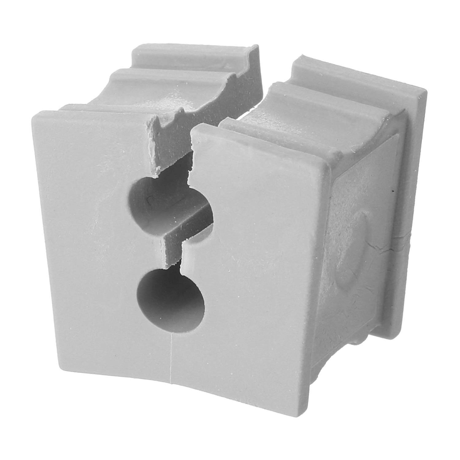 Ein graues Klappschalen-Design-Plastikgerät, wahrscheinlich ein Kabelorganisator oder -schutz, mit zwei kreisrunden Aussparungen für Kabel oder Leitungen.