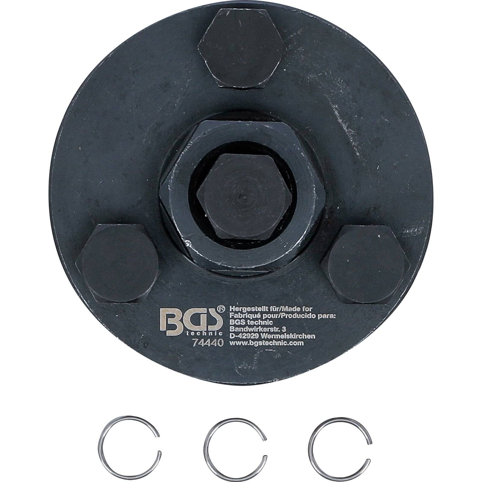 Ein schwarzes Automotivwerkzeug mit dem Text 'BGS' und '7440', der an der Basis eingeprägt ist, umgeben von drei kleinen C-förmigen Clips, die darunter positioniert sind.
