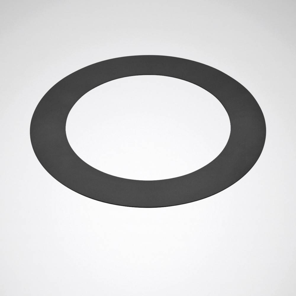 Ein großer, flacher, schwarzer Ring ruht zentral auf einer weißen Oberfläche und erzeugt einen starken Kontrast. Keine weiteren Details oder Kontextinformationen verfügbar.