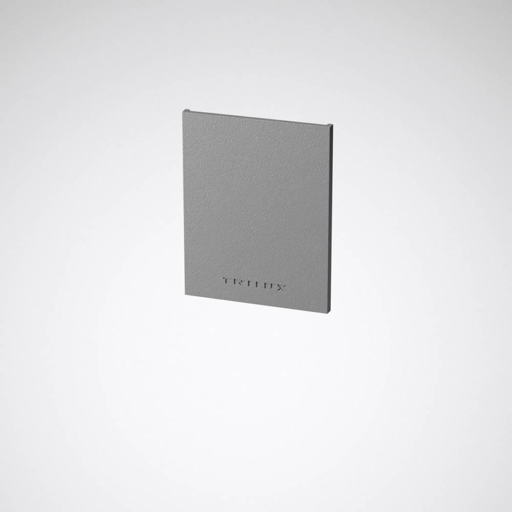 Eine strukturierte, graue, rechteckige Tafel, die vor einem schlichten Hintergrund leicht geneigt ist. Das Wort ‚TEXTUR' ist mittig in die Tafel eingeprägt.
