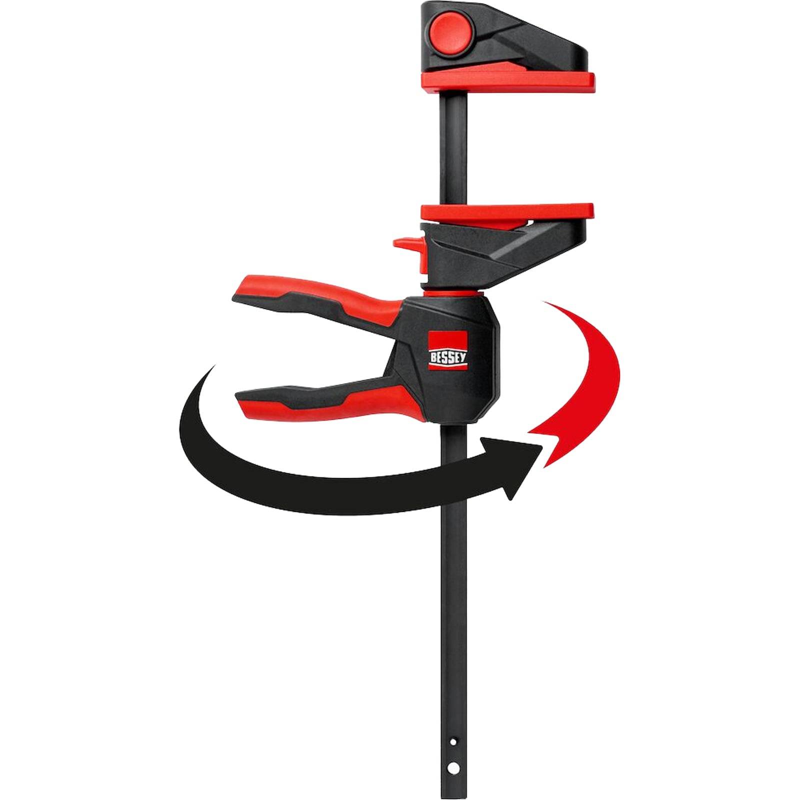 Eine schwarze und rote Klemmzange mit rotierendem Griff und Druckpolstern, wahrscheinlich für Holzarbeiten oder Handwerk verwendet, um Objekte fest zu fixieren.