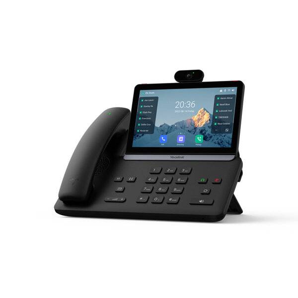 Schwarzes Desktop-Videotelefon mit Hörer, Tastenfeld und Touchscreen, auf dem ein Startbildschirm mit App-Symbolen und der Uhrzeit 20:36 angezeigt wird.