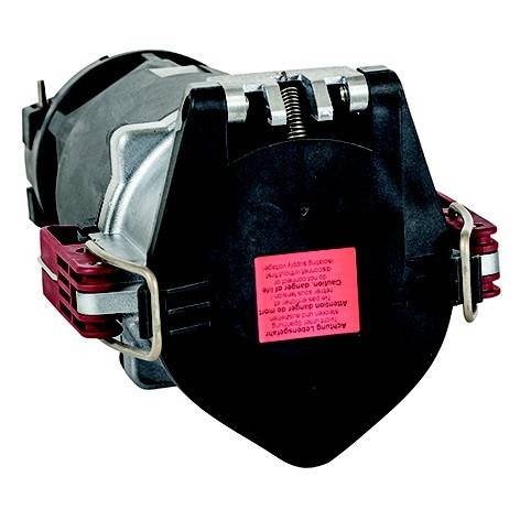 Schwarzes mechanisches Gerät mit roten Seitenklemmen und einem rosa Warnschild, dargestellt auf weißem Hintergrund.
