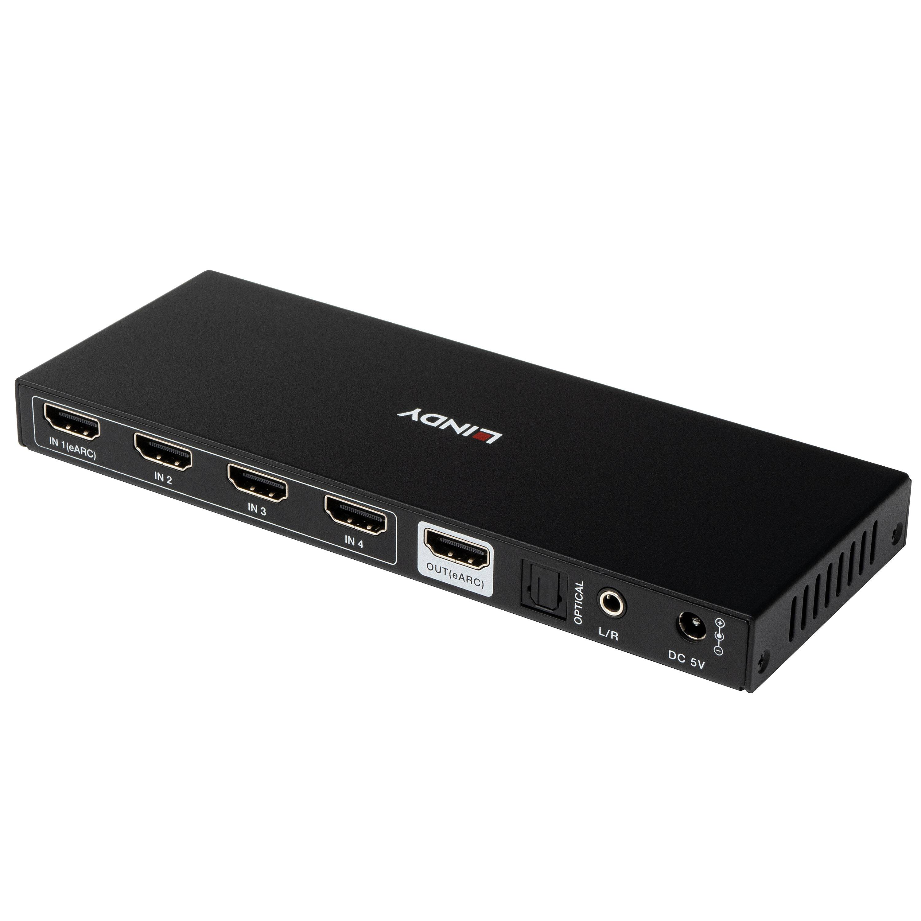 Schwarze HDMI-Umschalterbox mit vier Eingängen, einem Ausgang und einer 5V-Gleichstrom-Buchse auf weißem Hintergrund.