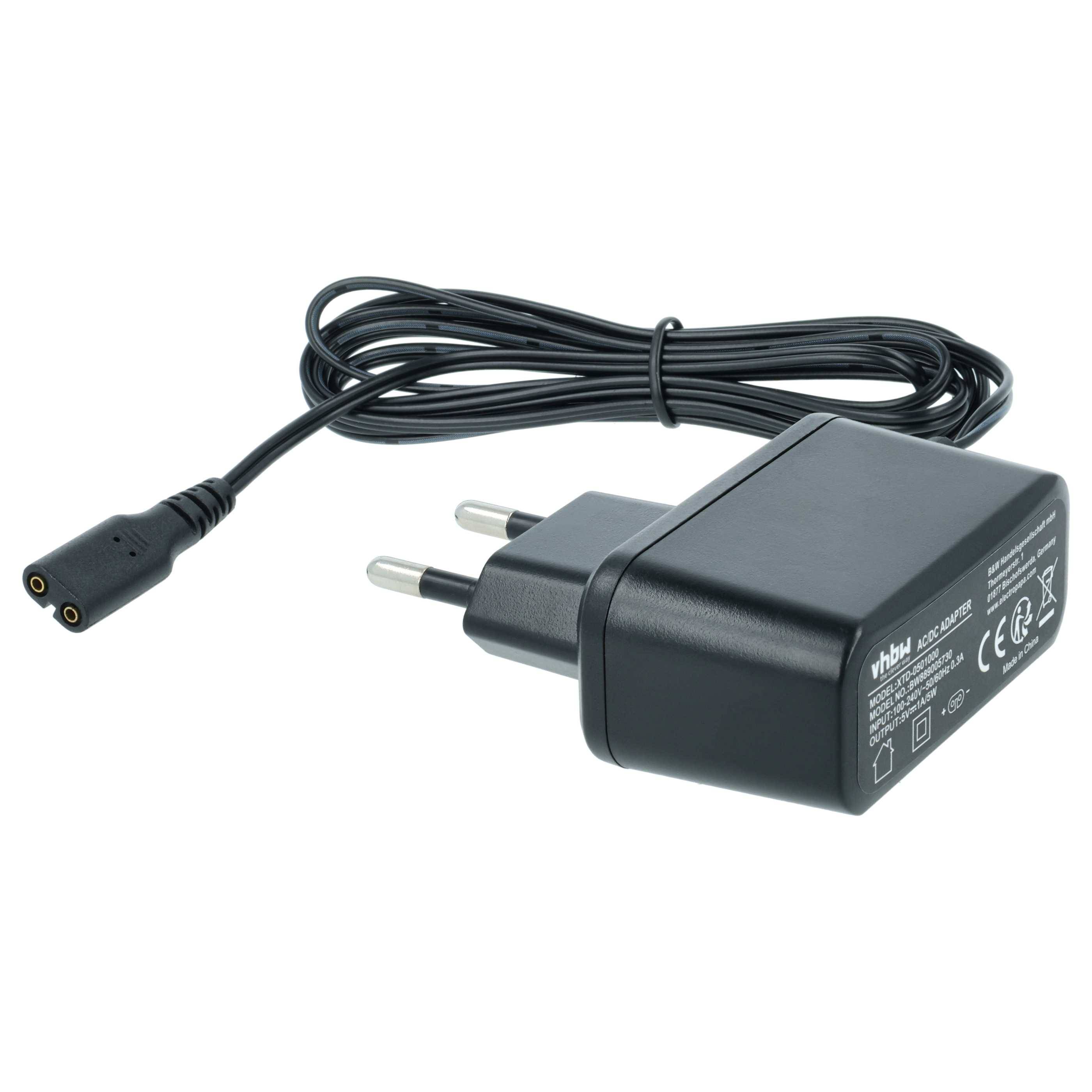 Ein schwarzes Netzteil mit einem europäischen Stecker und einem langen Kabel, entwickelt zum Aufladen elektronischer Geräte.