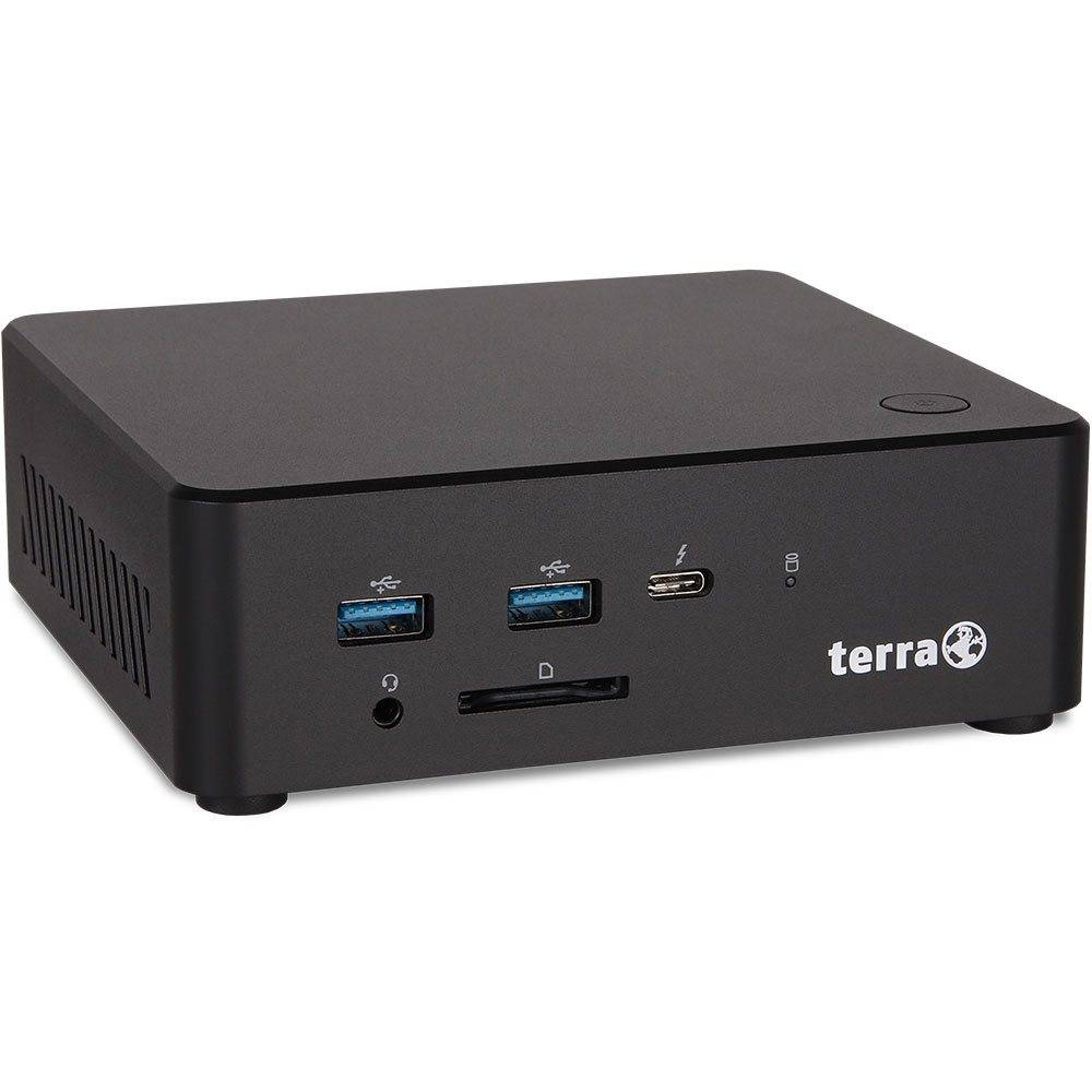 Ein kleiner schwarzer Desktop-Computer mit USB-Anschlüssen, Kopfhörerbuchse und SD-Karteneinschub an der Frontseite. Der Markenname 'terra' ist sichtbar.