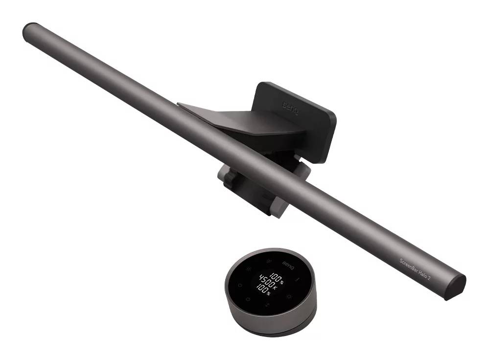 Eine elegante, graue Schreibtischleuchte mit digitaler Einstellscheibe, die Helligkeitseinstellungen zeigt. Das Markenlogo ist dezent auf der Leuchte sichtbar.