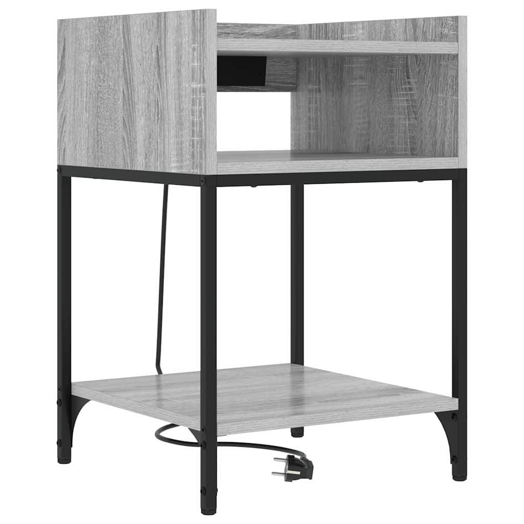 Kompakter Computertisch mit schwarzen Metallbeinen, Holzmaserung-Platte und Regal sowie einem kleinen oberen Aufbewahrungsfach mit sichtbarem Stromkabel.