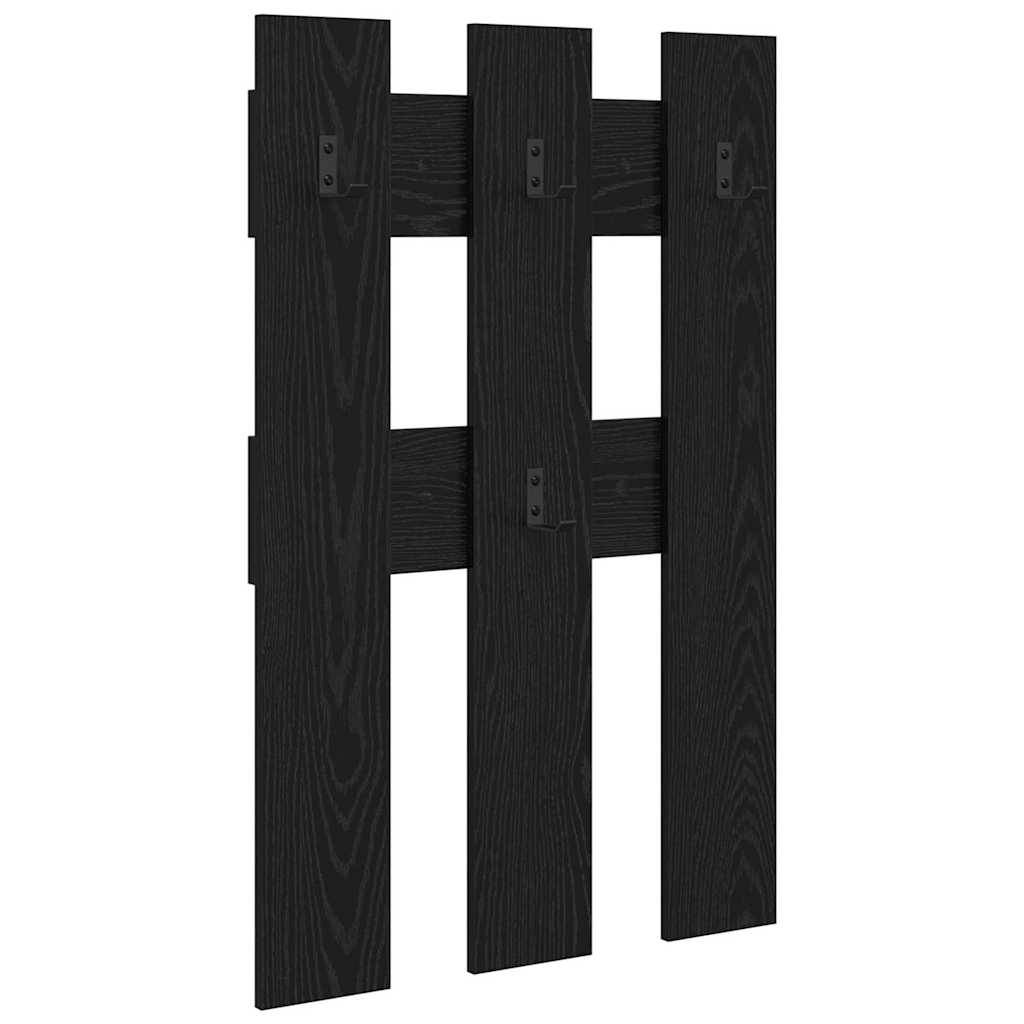 „Ein schwarzes Holzzaunpaneel mit drei vertikalen Latten und horizontalen Trägern, das ein einfaches Design für den Einsatz im Freien zur Privatsphäre aufweist.