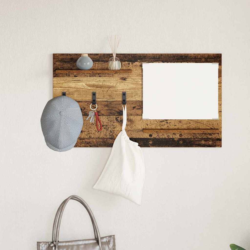 Eine Holz-Wandorganisation mit Haken hält eine Kappe, Schlüssel, eine kleine Tasche und eine Vase. Sie verfügt über einen leeren Whiteboard-Bereich für Notizen.