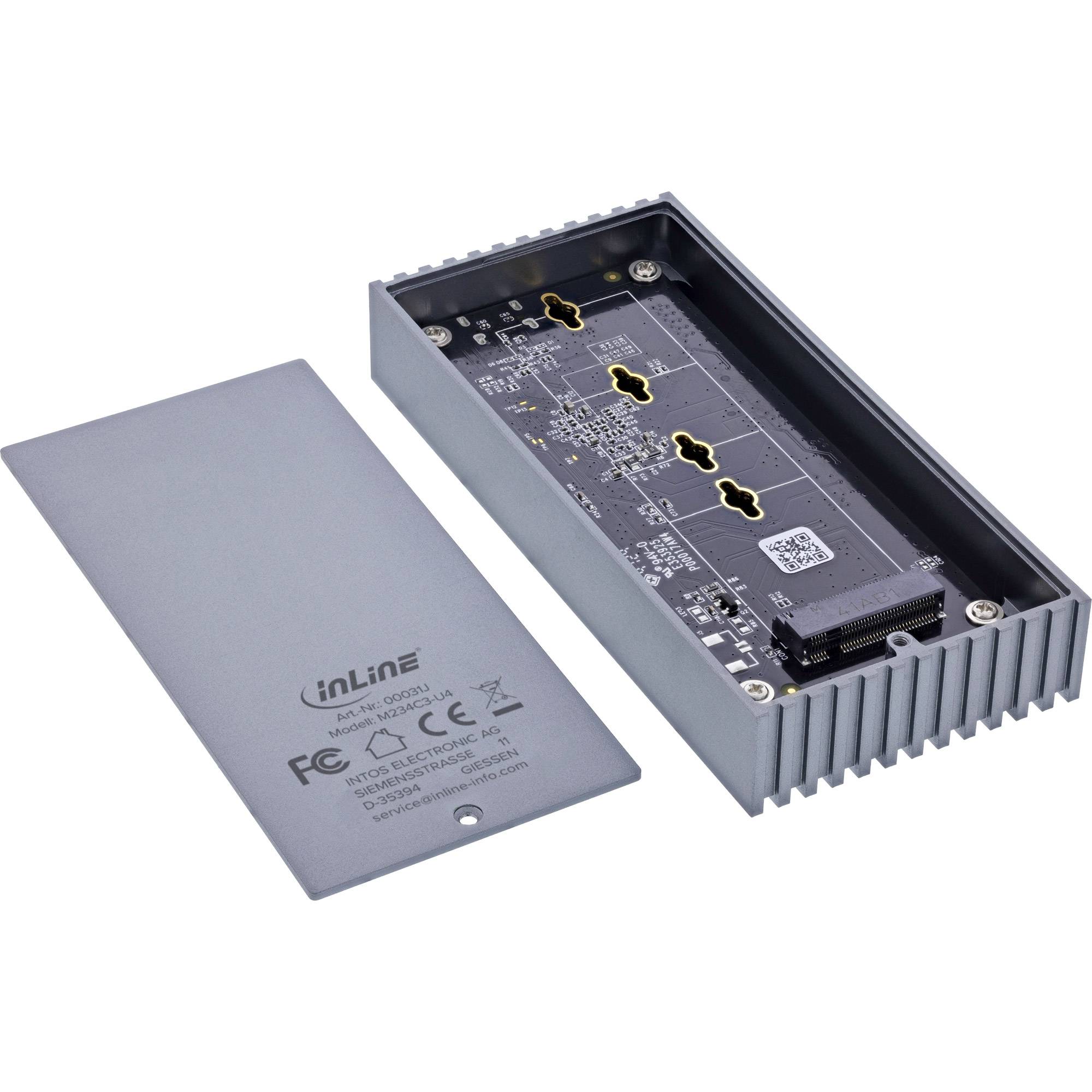Aluminiumgehäuse für M.2 SSD, Modell 36638, von InLine, geöffnet, um die interne Leiterplatte zu zeigen, mit abgenommenem Deckel, auf dem Sicherheitssymbole zu sehen sind.