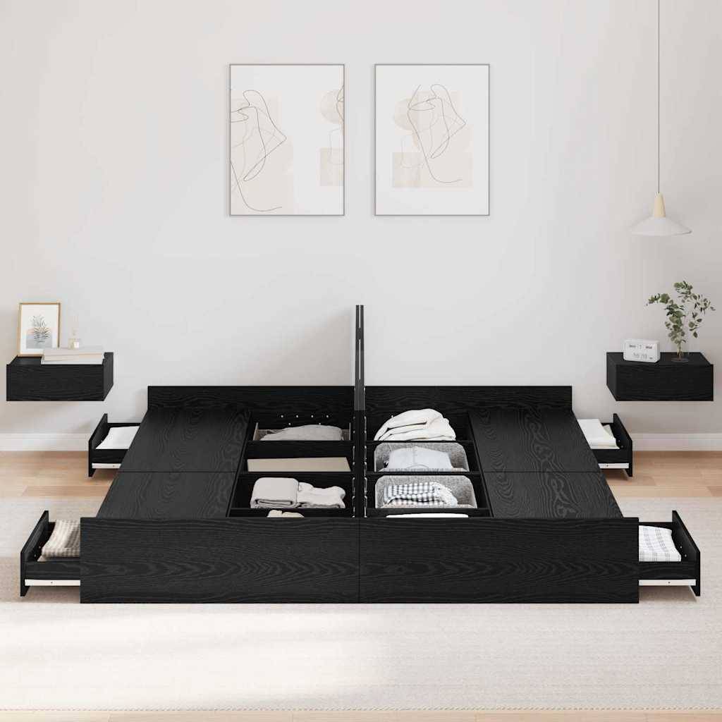 Ein modernes schwarzes Stauraumbett mit Ausziehschubladen, ordentlich gefüllt mit Kleidung, steht vor einer weißen Wand, an der zwei abstrakte gerahmte Kunstwerke hängen.
