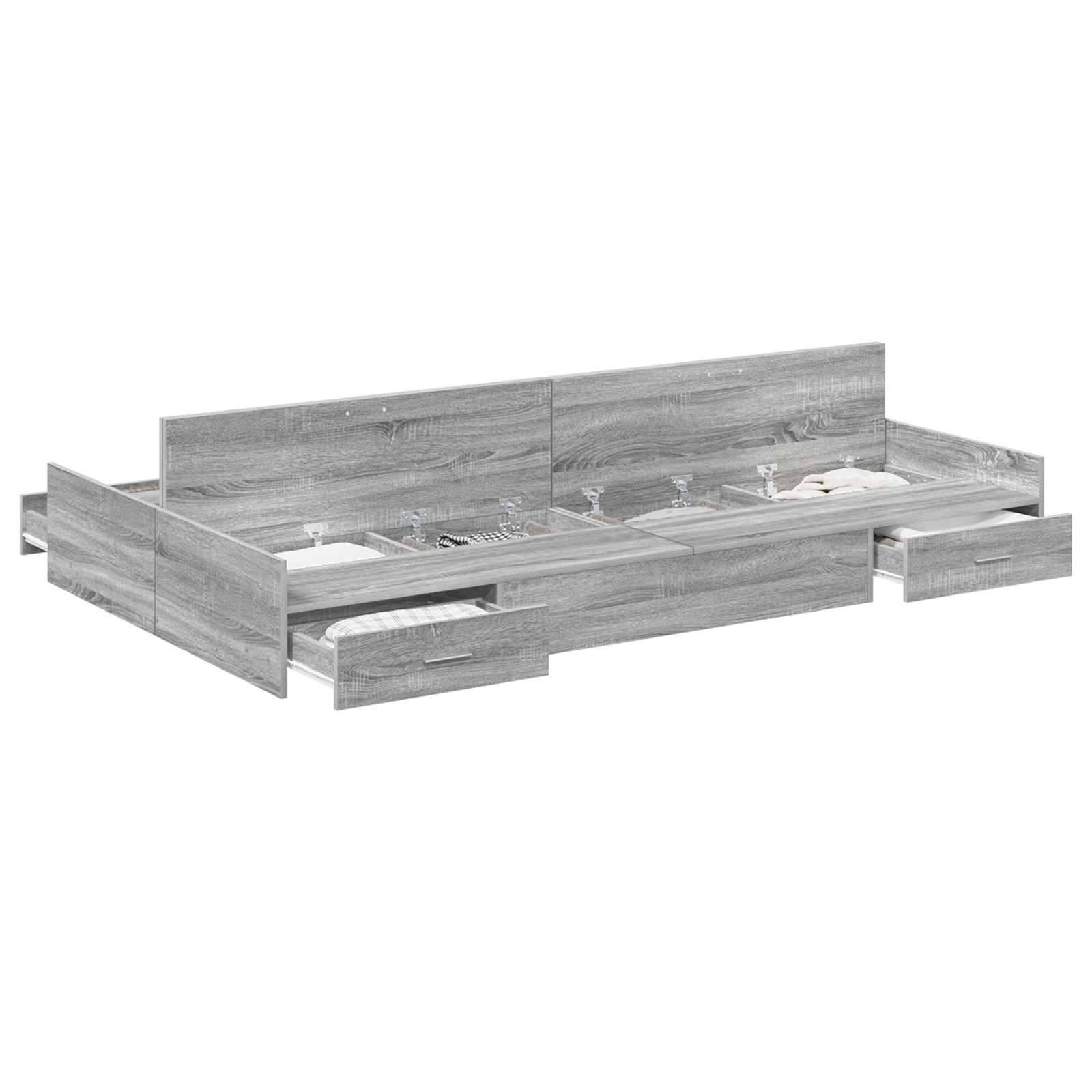 Ein grauer Holzbettrahmen mit mehreren offenen Schubladen, die Stauraum zeigen und ein modernes Design mit Funktionalität zur Organisation präsentieren.