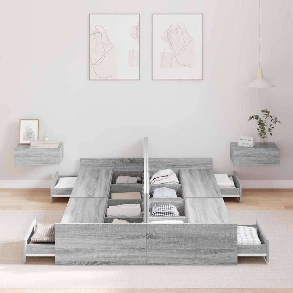 Ein modernes Schlafzimmer präsentiert ein flaches Bett mit integrierten grauen Staurageschubladen, in denen ordentlich gefaltete Kleidungsstücke untergebracht sind, flankiert von schwebenden Nachttischen.