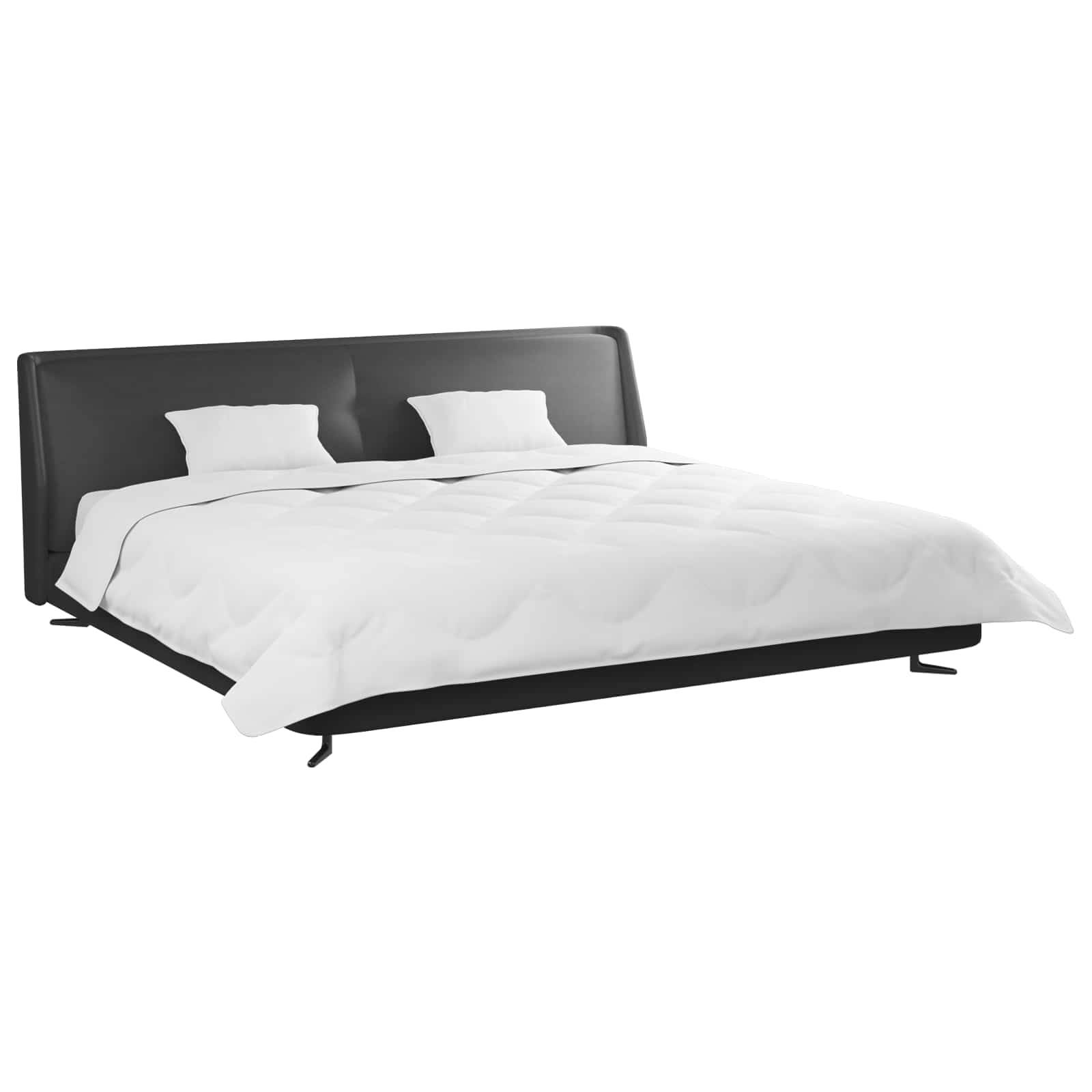 Ein modernes schwarzes Plattformbett mit einem niedrigen Kopfteil, bezogen mit einer weißen gesteppten Bettdecke und zwei weißen Kissen.
