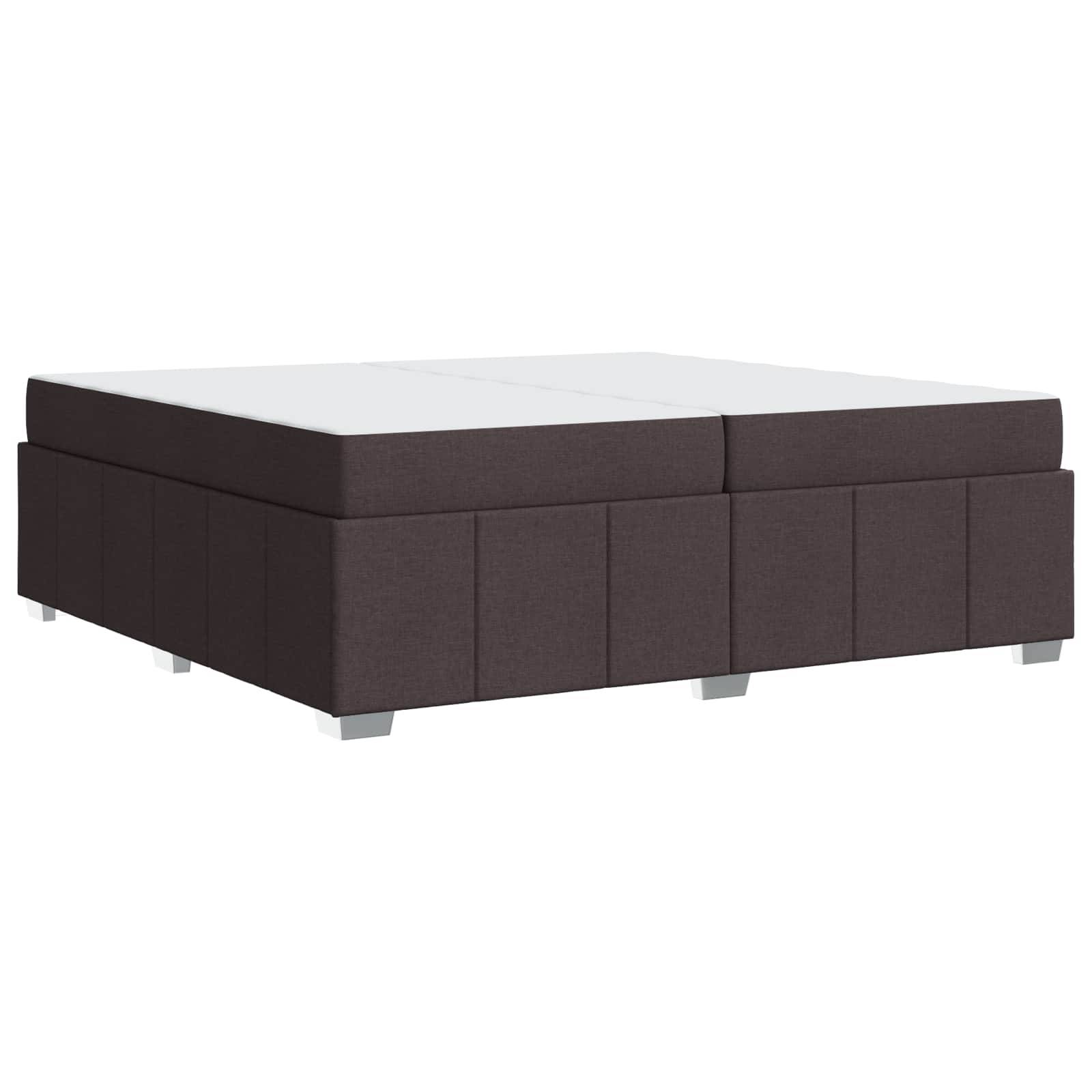 Eine dunkel gepolsterte Bettstatt mit einem einfachen, minimalistischen Design, die auf vier sichtbaren Beinen steht und sich für ein modernes Schlafzimmer eignet.