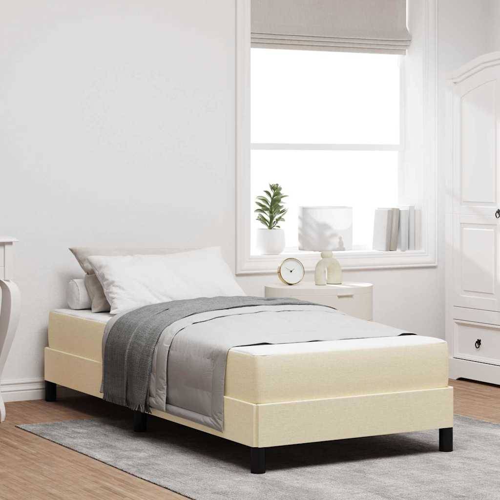 Minimalistisches Schlafzimmer mit einem einzelnen Bett, grauer Bettwäsche, Nachttisch am Fenster und weißem Kleiderschrank in einem hellen, sauberen Innenraum.